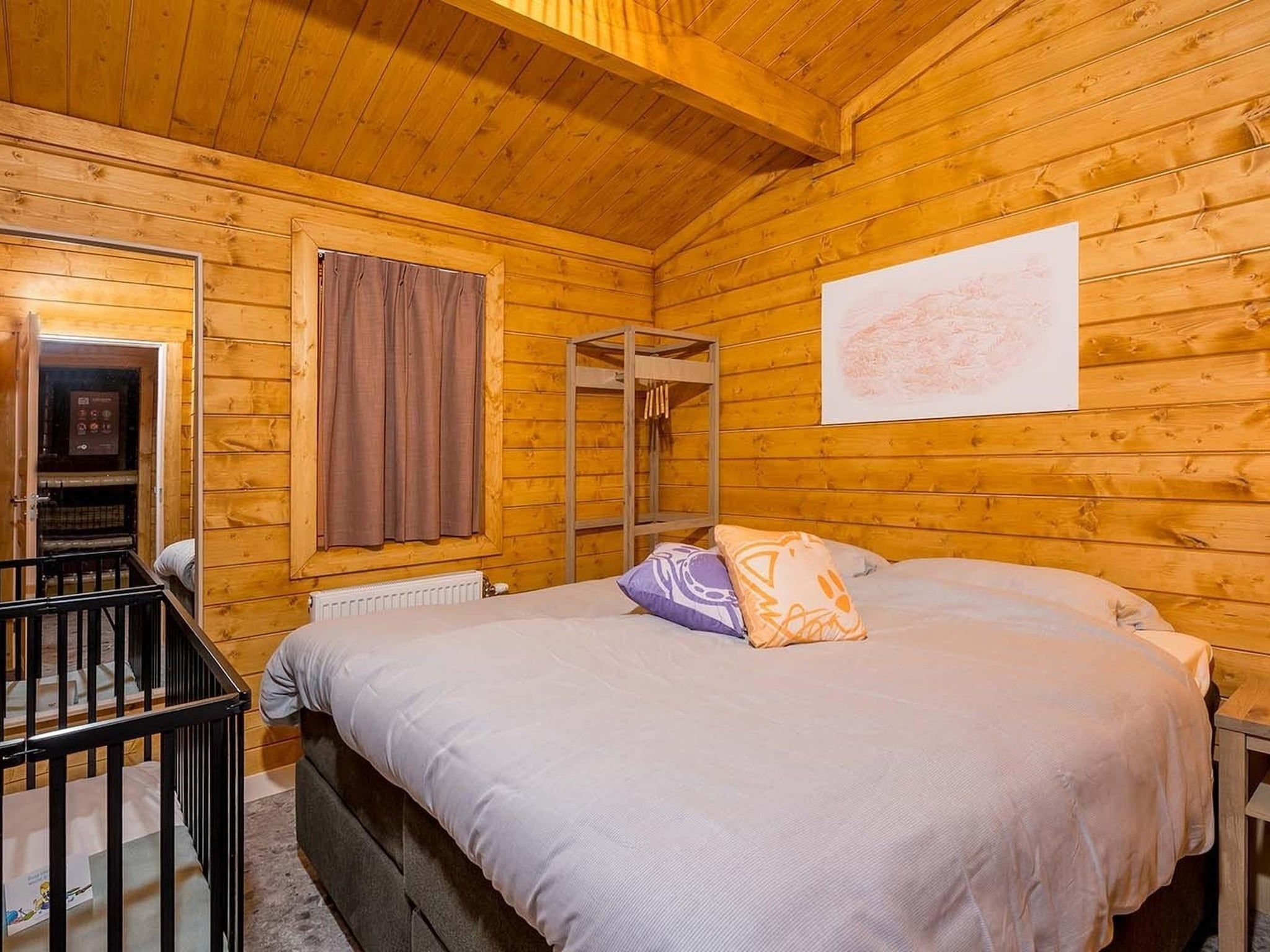 Een slaapkamer van Woezel & Pip Lodge 6p - Met Speelkamer in Hoogerheide
