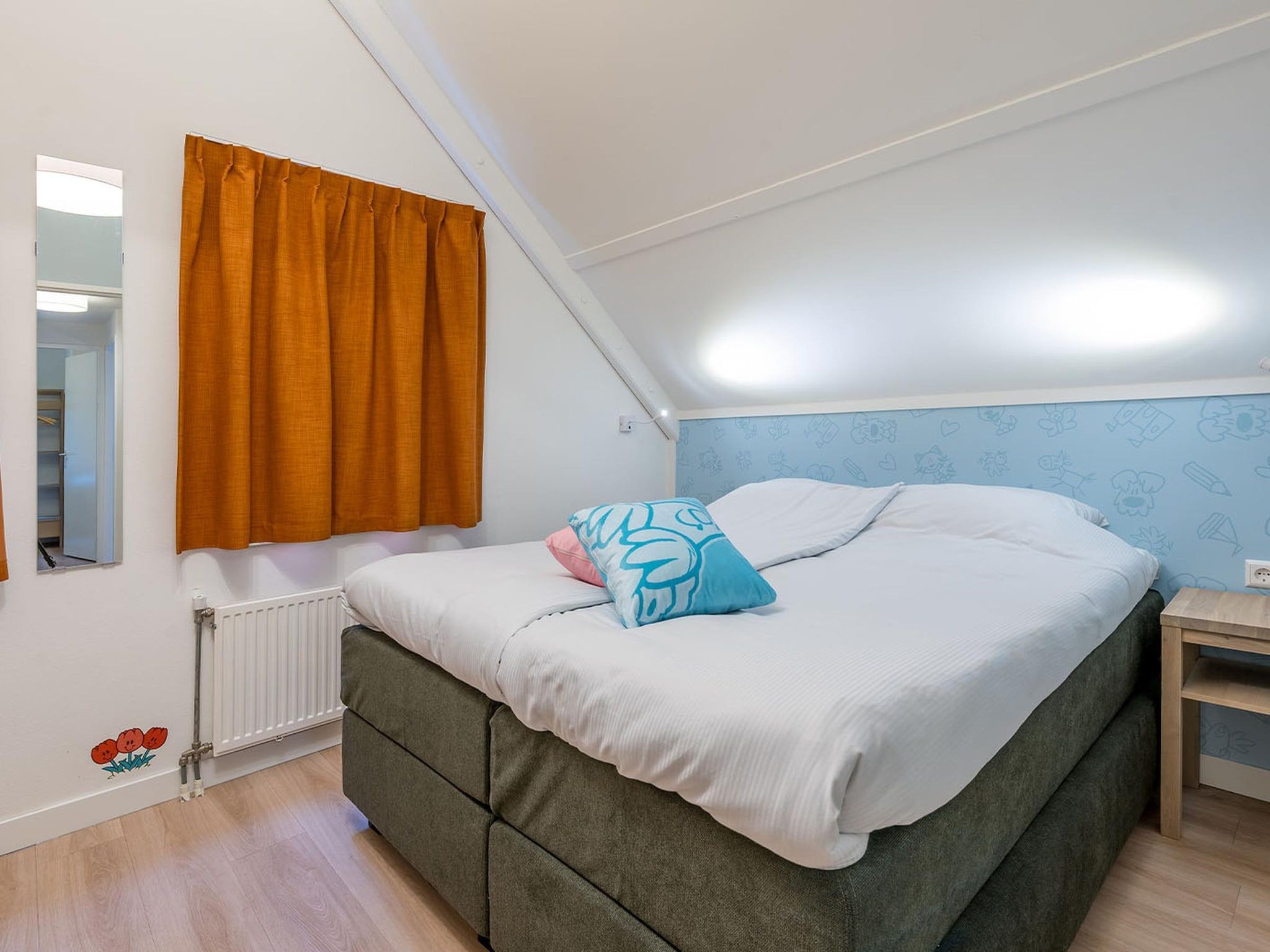 Een slaapkamer van Woezel & Pip Villa - Mindervaliden 8p in Hoogerheide