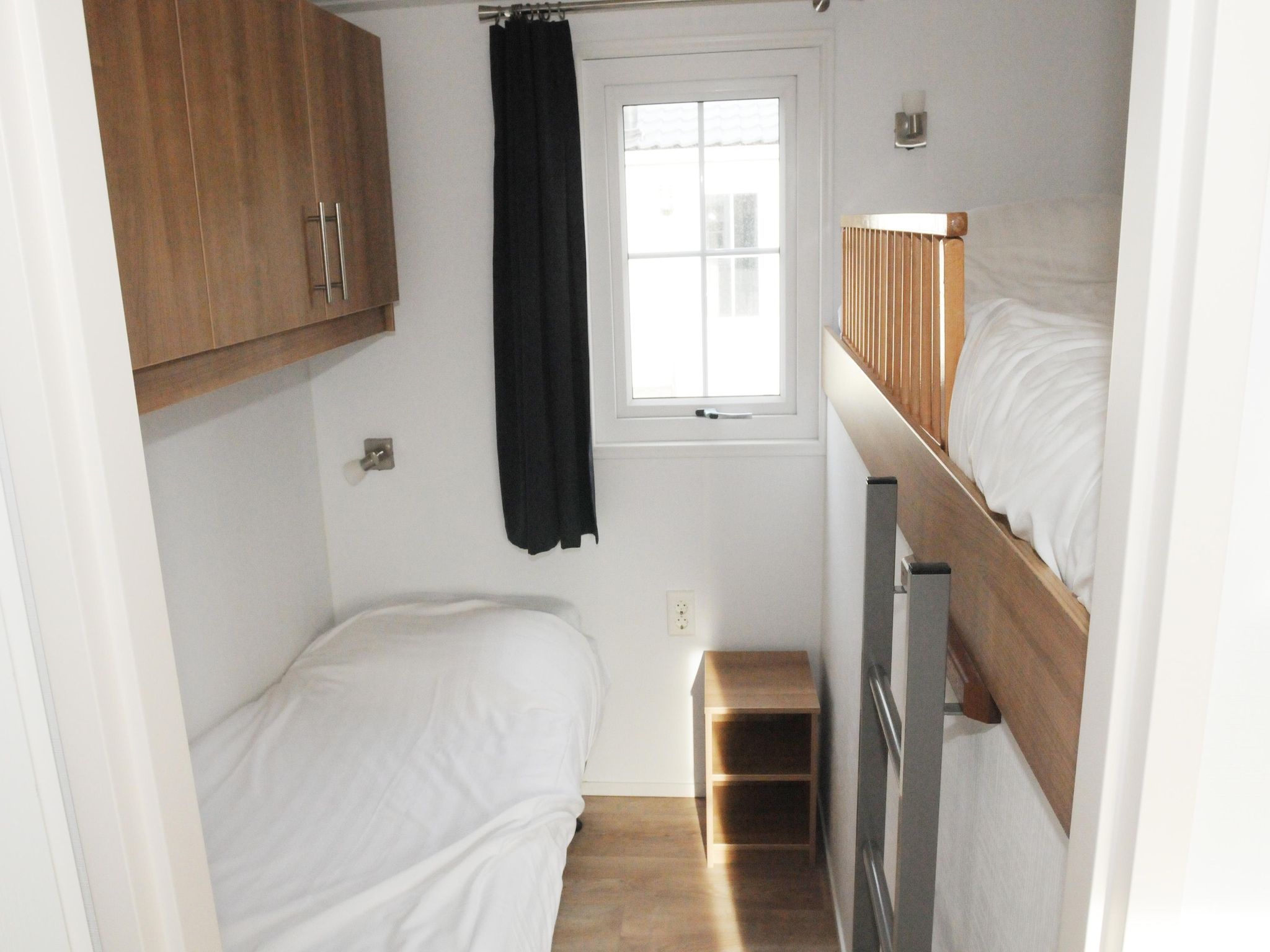 Een slaapkamer van Villetta (6p) in Den Burg