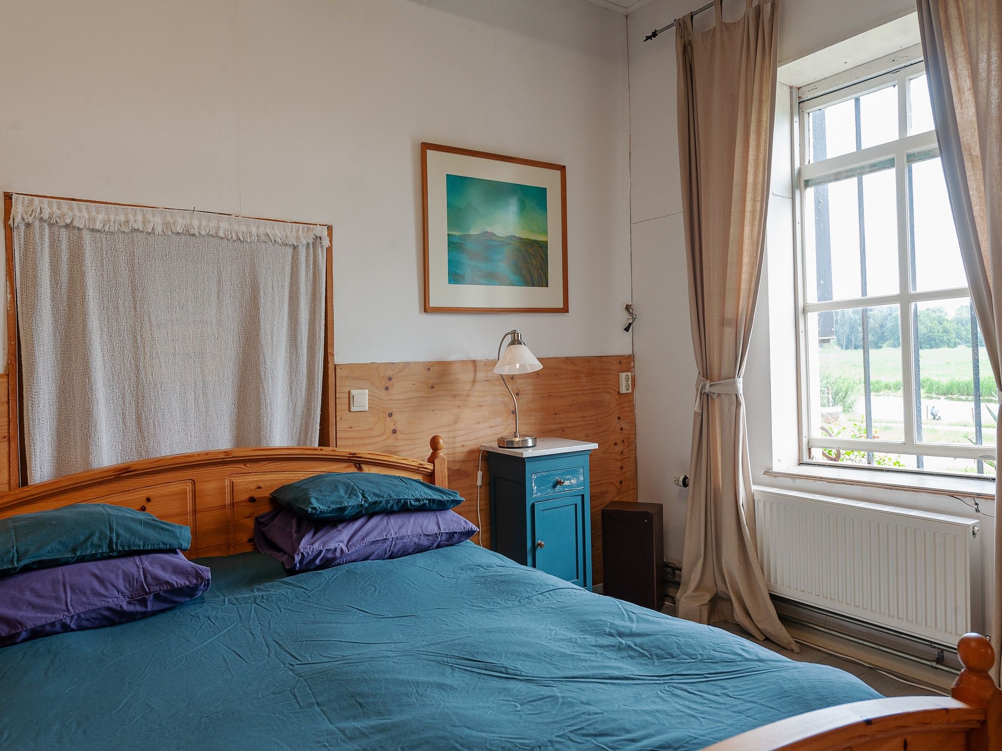 Een slaapkamer van Lauwerspleats in Burum
