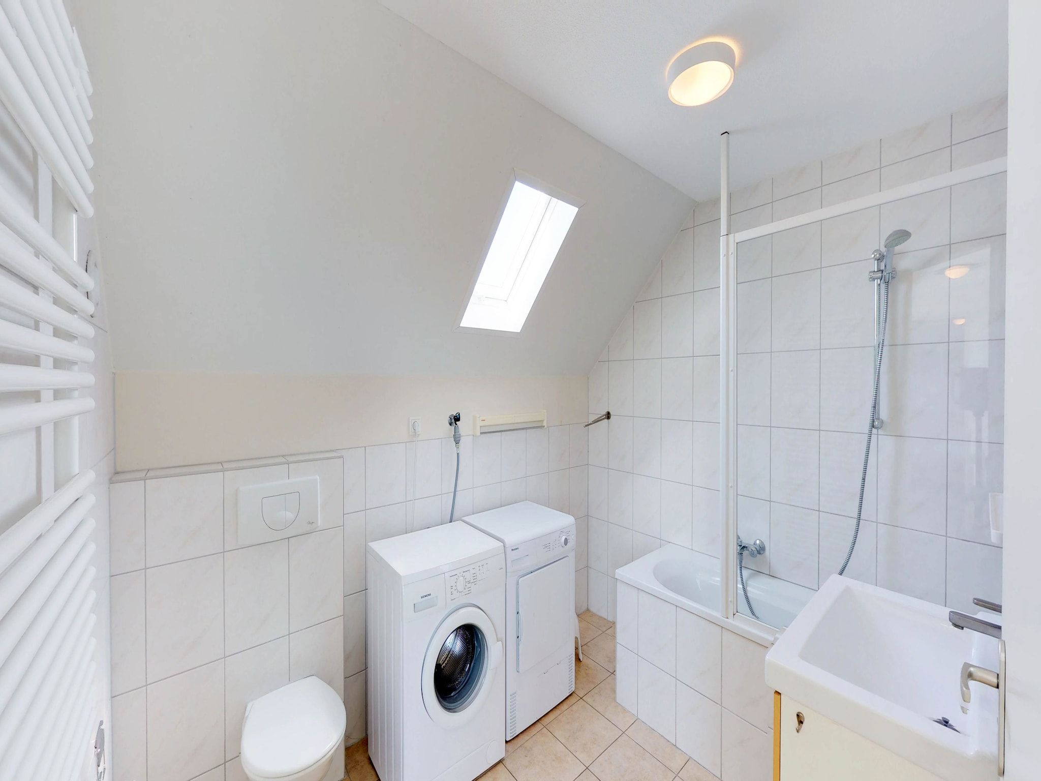 De badkamer van Villapark de Paardekreek 6 in Kortgene
