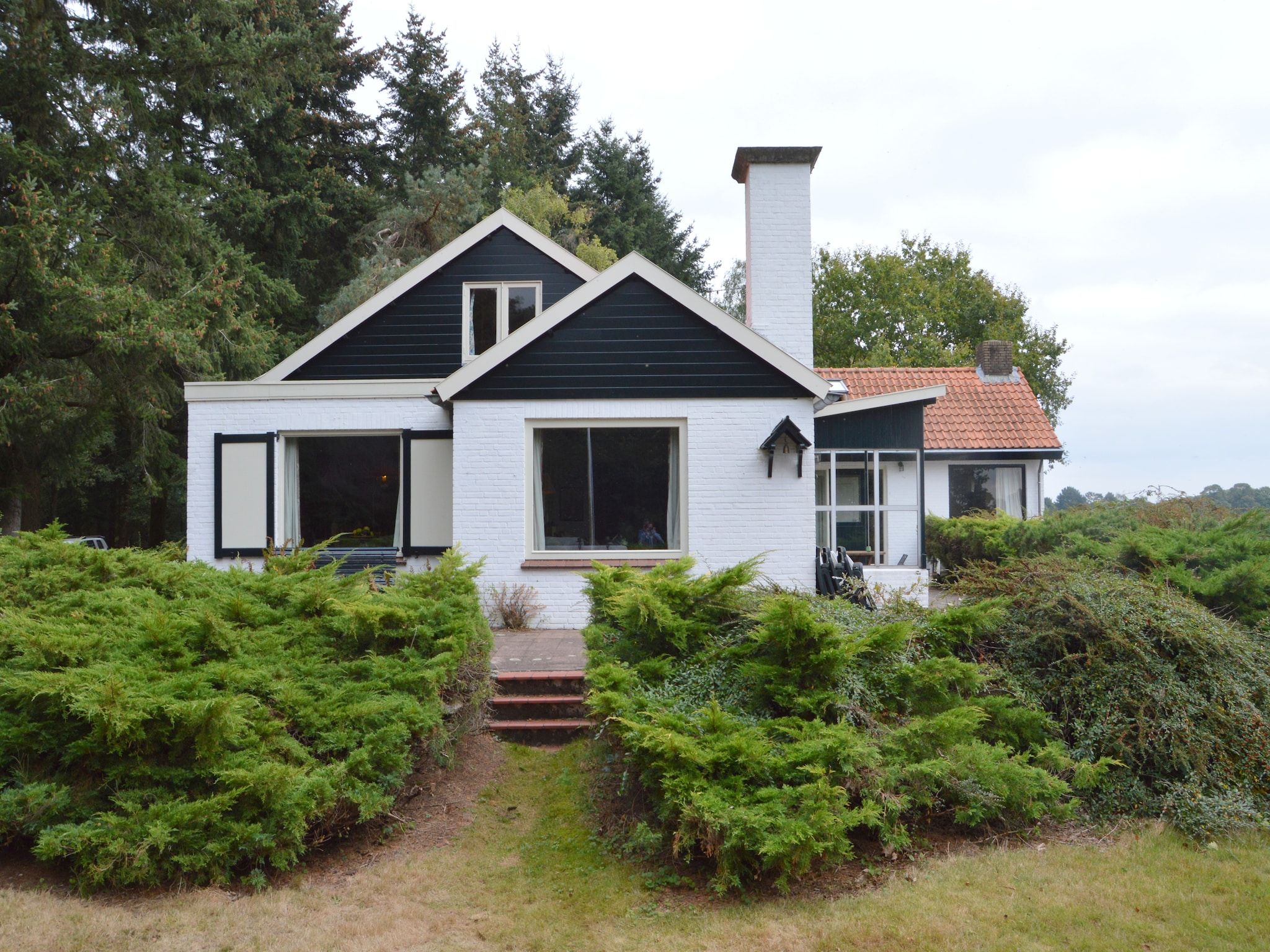 De buitenkant van Huis in het bos in Oploo