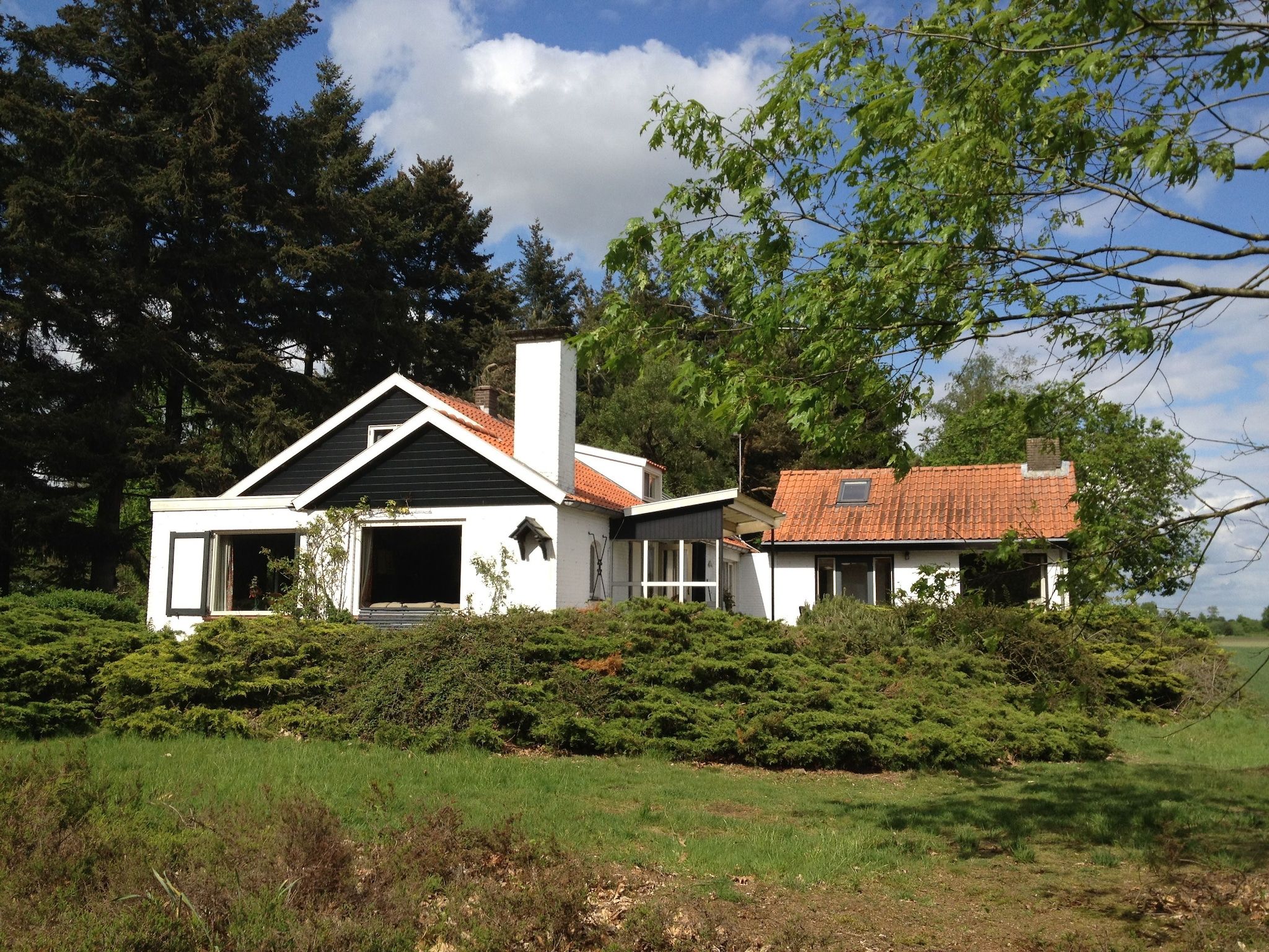 De buitenkant van Huis in het bos in Oploo