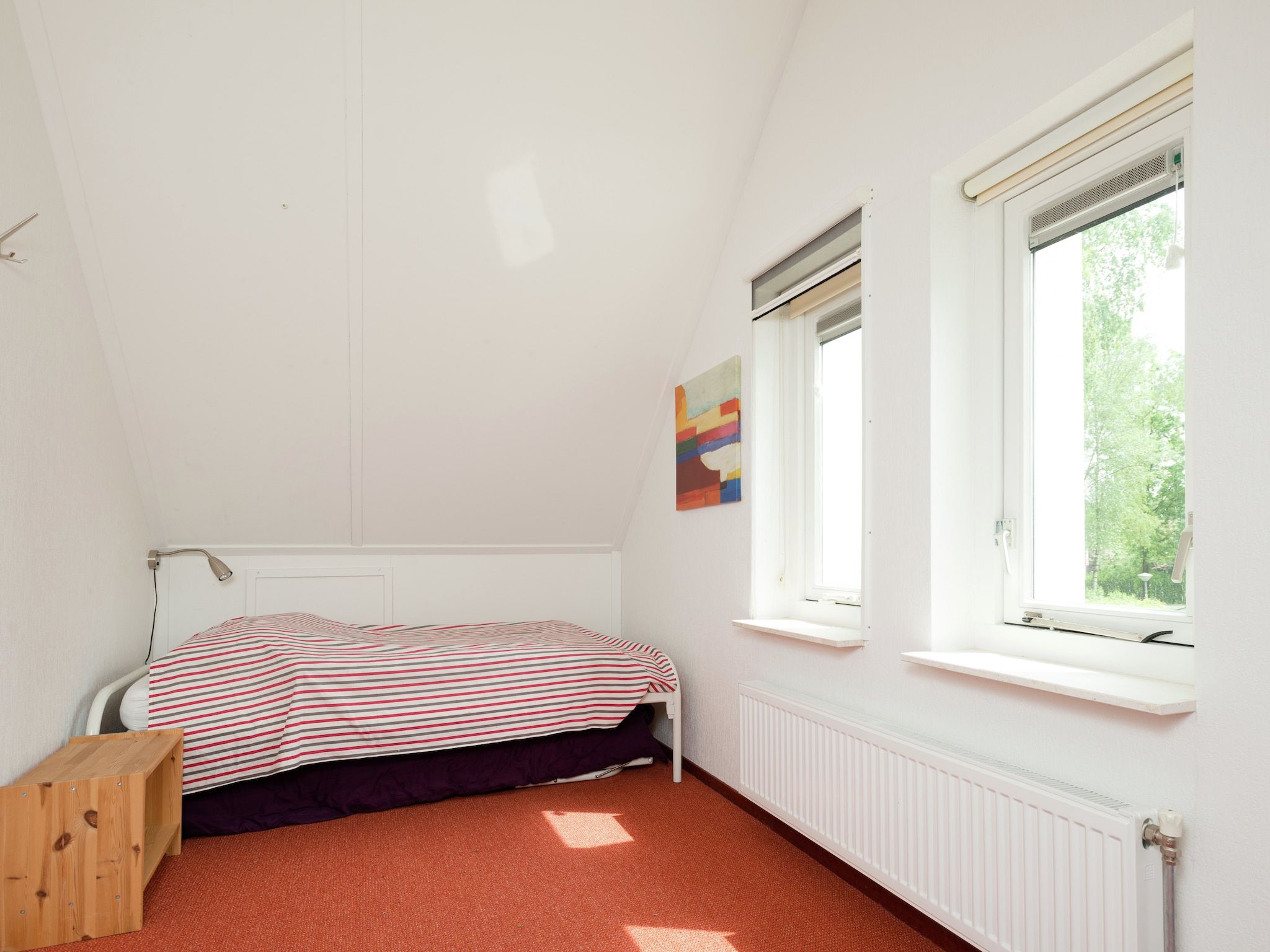 Een slaapkamer van Zonnenberg 34 in Heeten