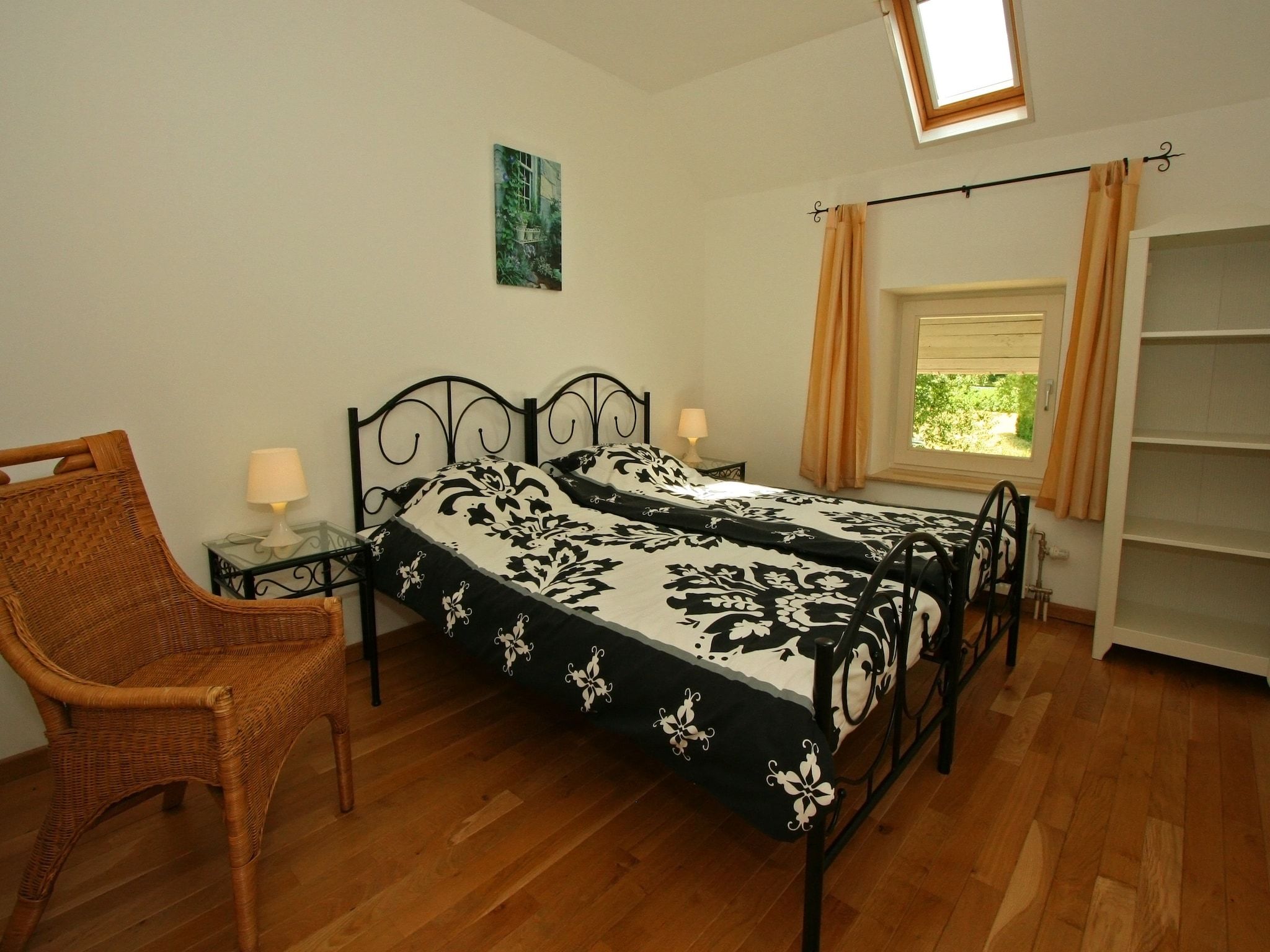 Een slaapkamer van Hoeve in gunne winkel 1 en 2 in Wijlre