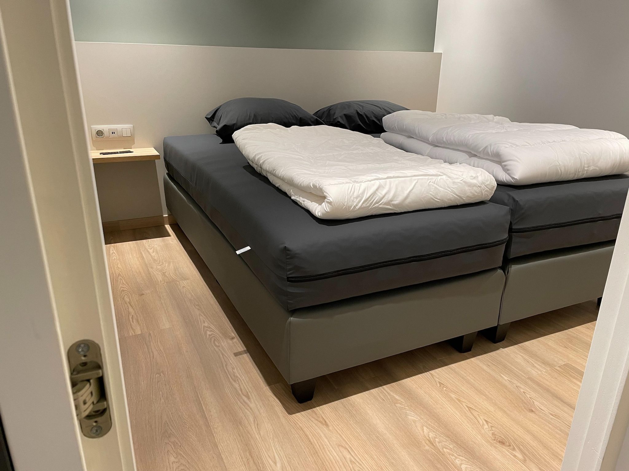 Een slaapkamer van Het Platte Putje - Huisdiervrij - nr3 in Groede