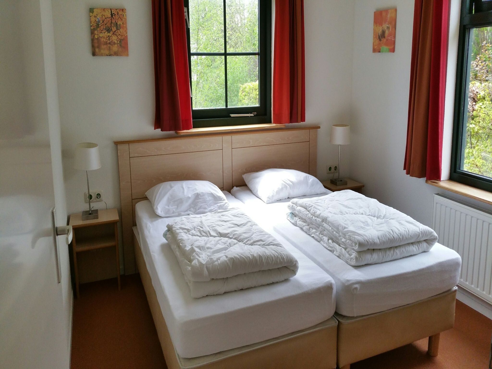 Een slaapkamer van Vakantiepark Eigen Wijze 5 in Bant