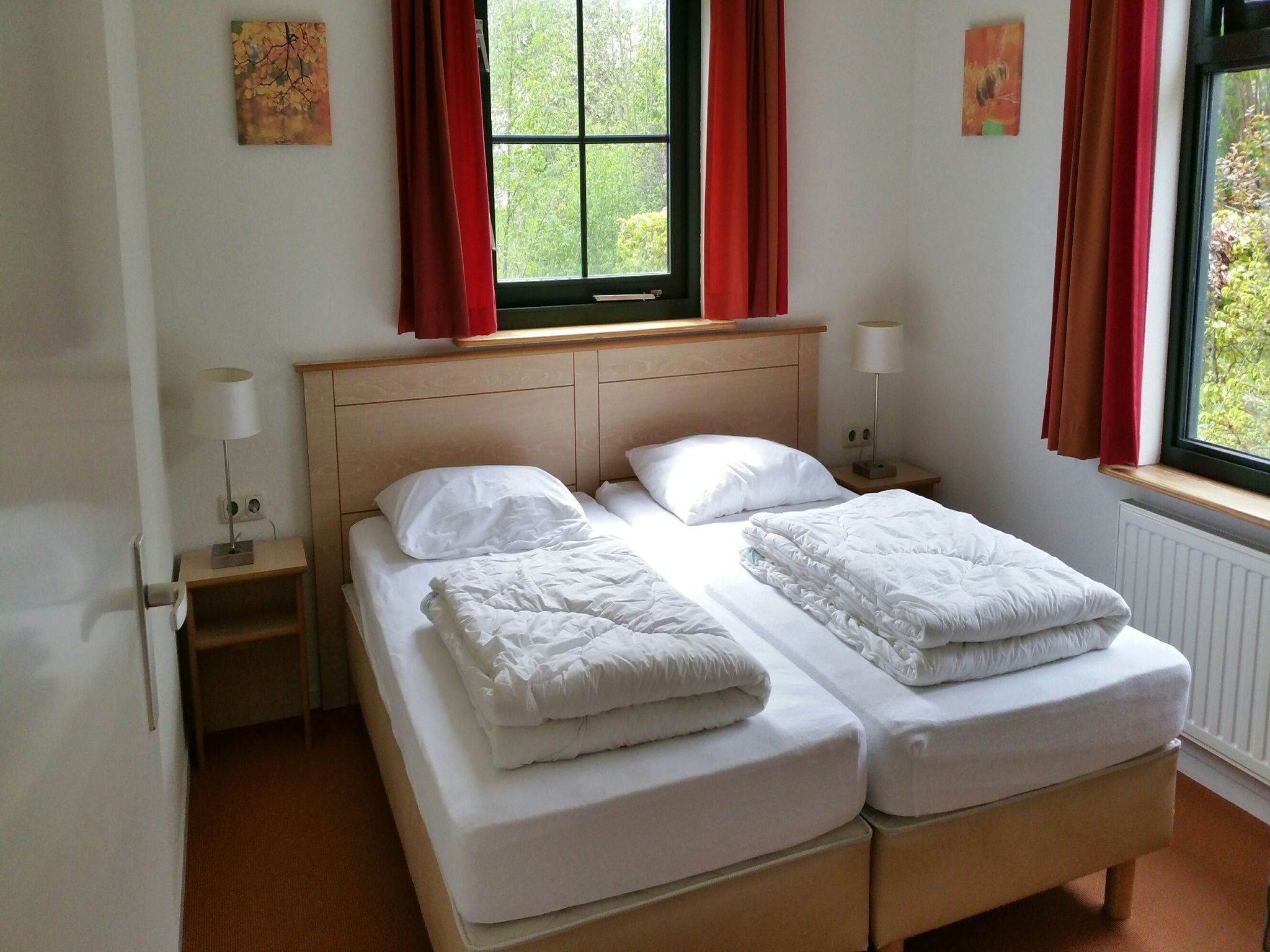 Een slaapkamer van Vakantiepark Eigen Wijze 4 in Bant