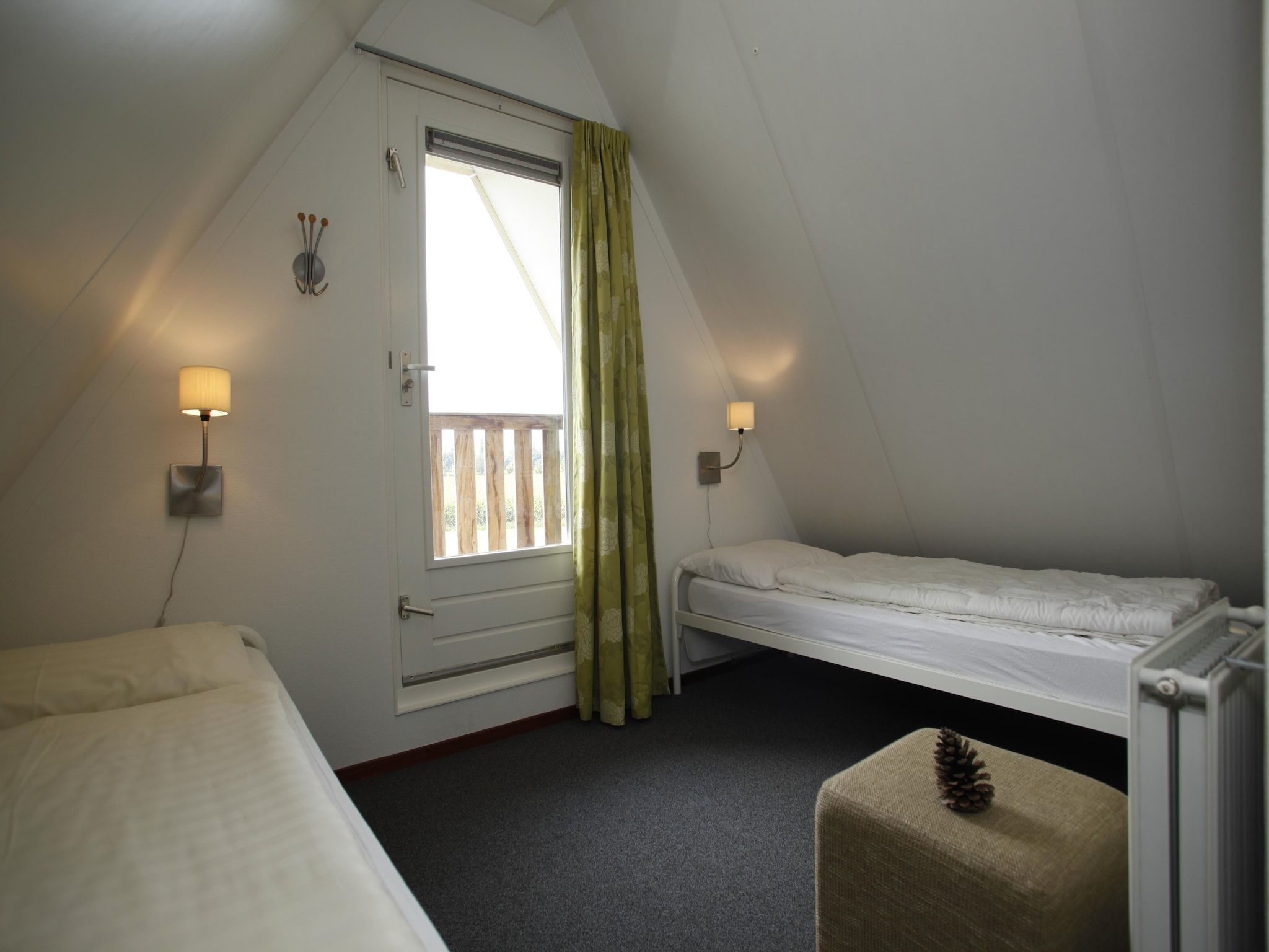 Een slaapkamer van Vakantie bij Meeussen - Molendal 1 in Plasmolen