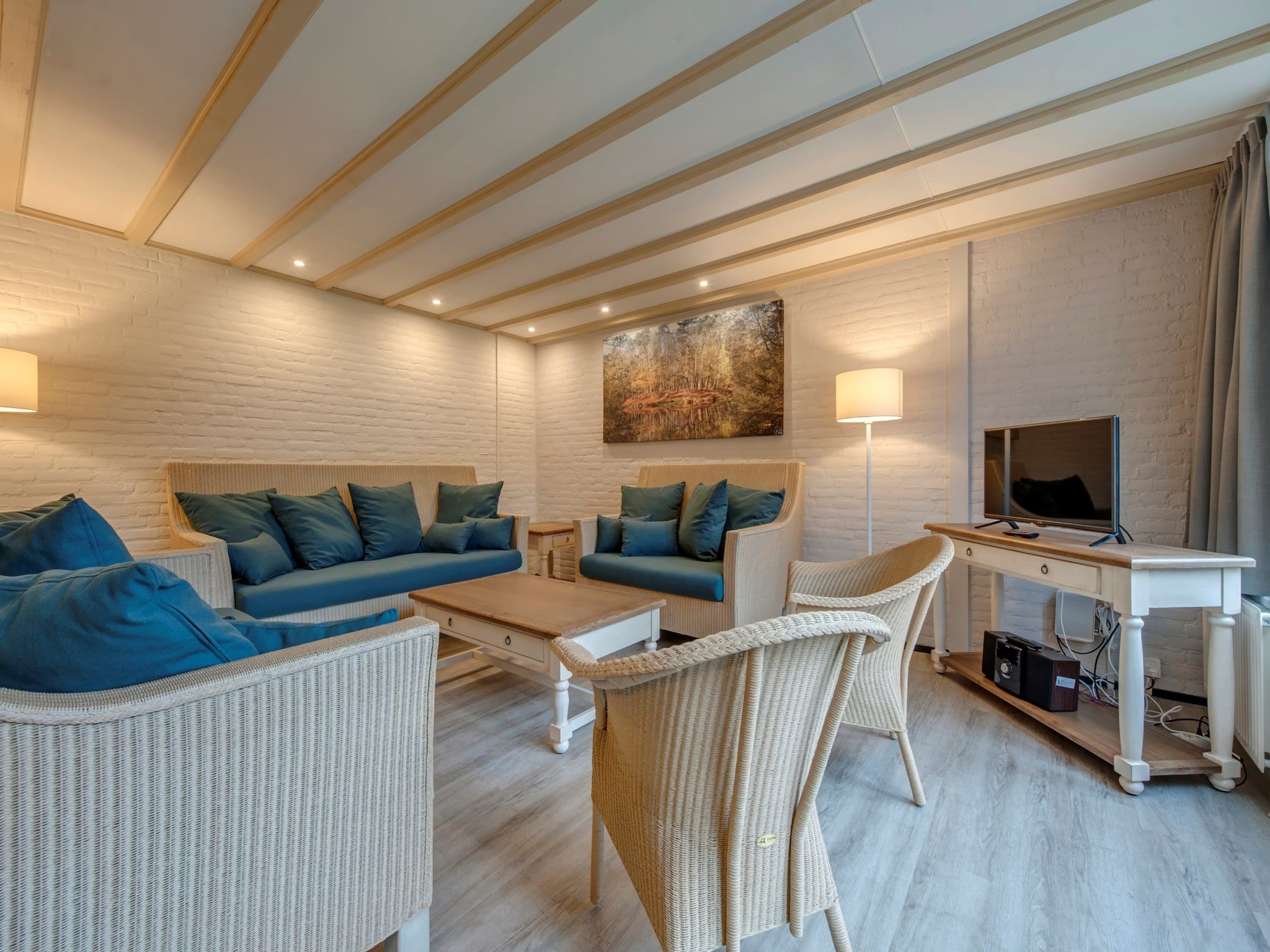 De woonkamer van Vakantiepark Klein Vink 13 in Arcen