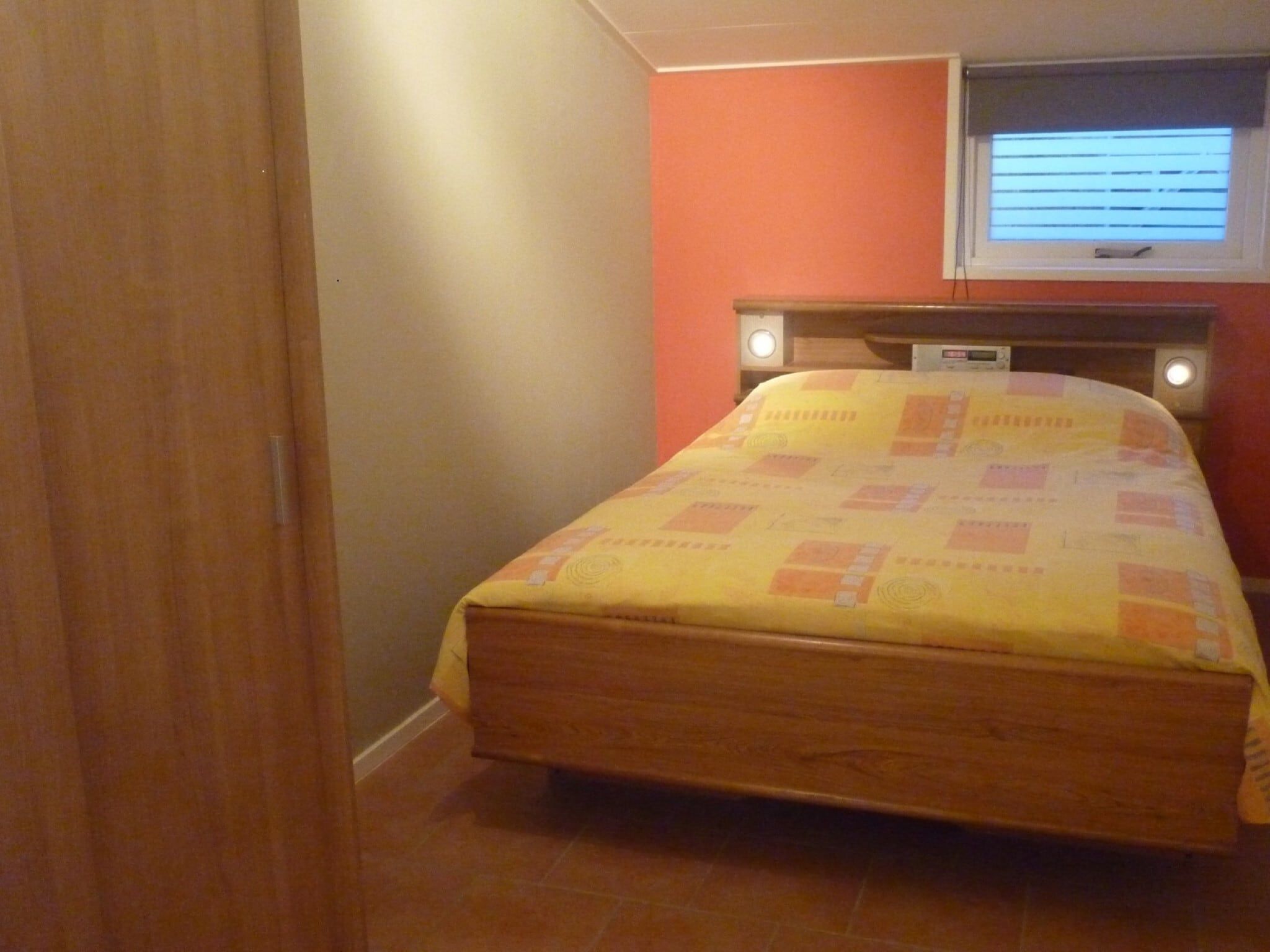 Een slaapkamer van Singelhoeve in Fochteloo