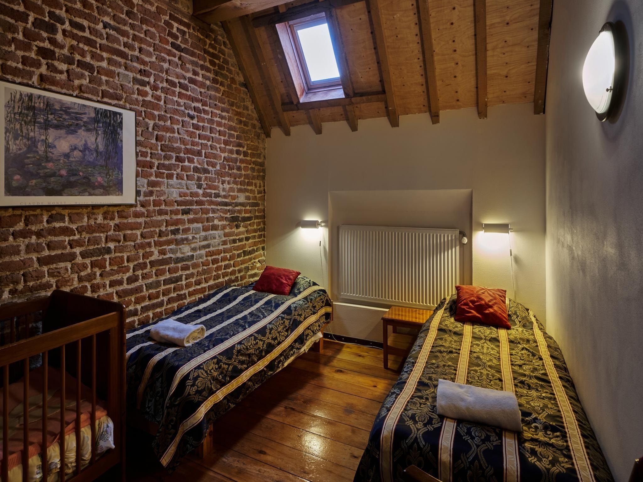 Een slaapkamer van Meschermolen 9 in Mesch-Eijsden