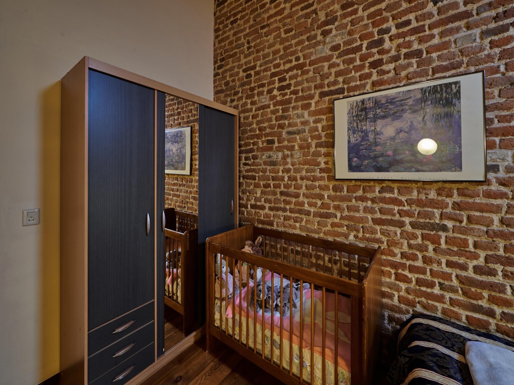 Een slaapkamer van Meschermolen 9 in Mesch-Eijsden