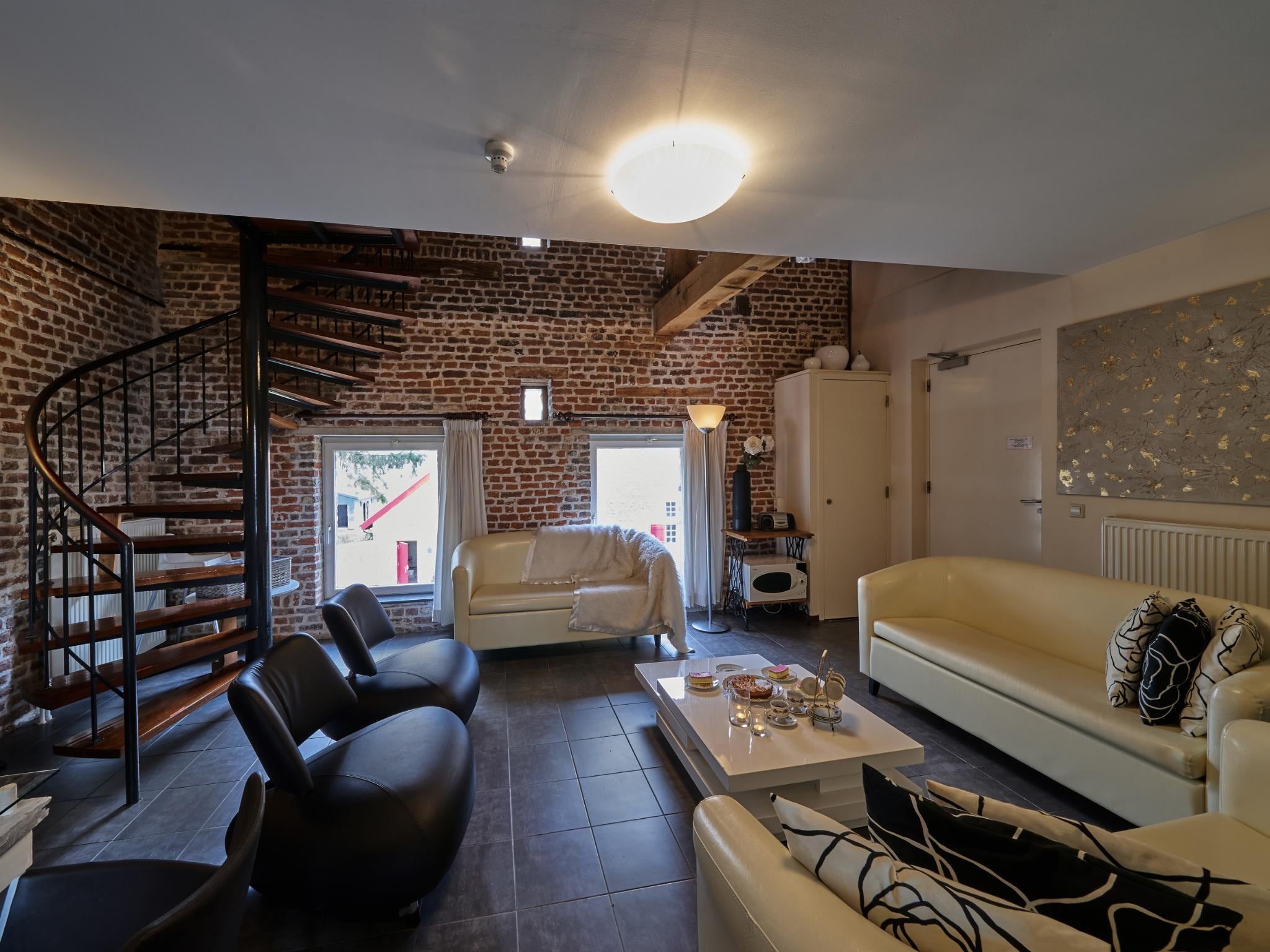 De woonkamer van Meschermolen 10 in Mesch-Eijsden