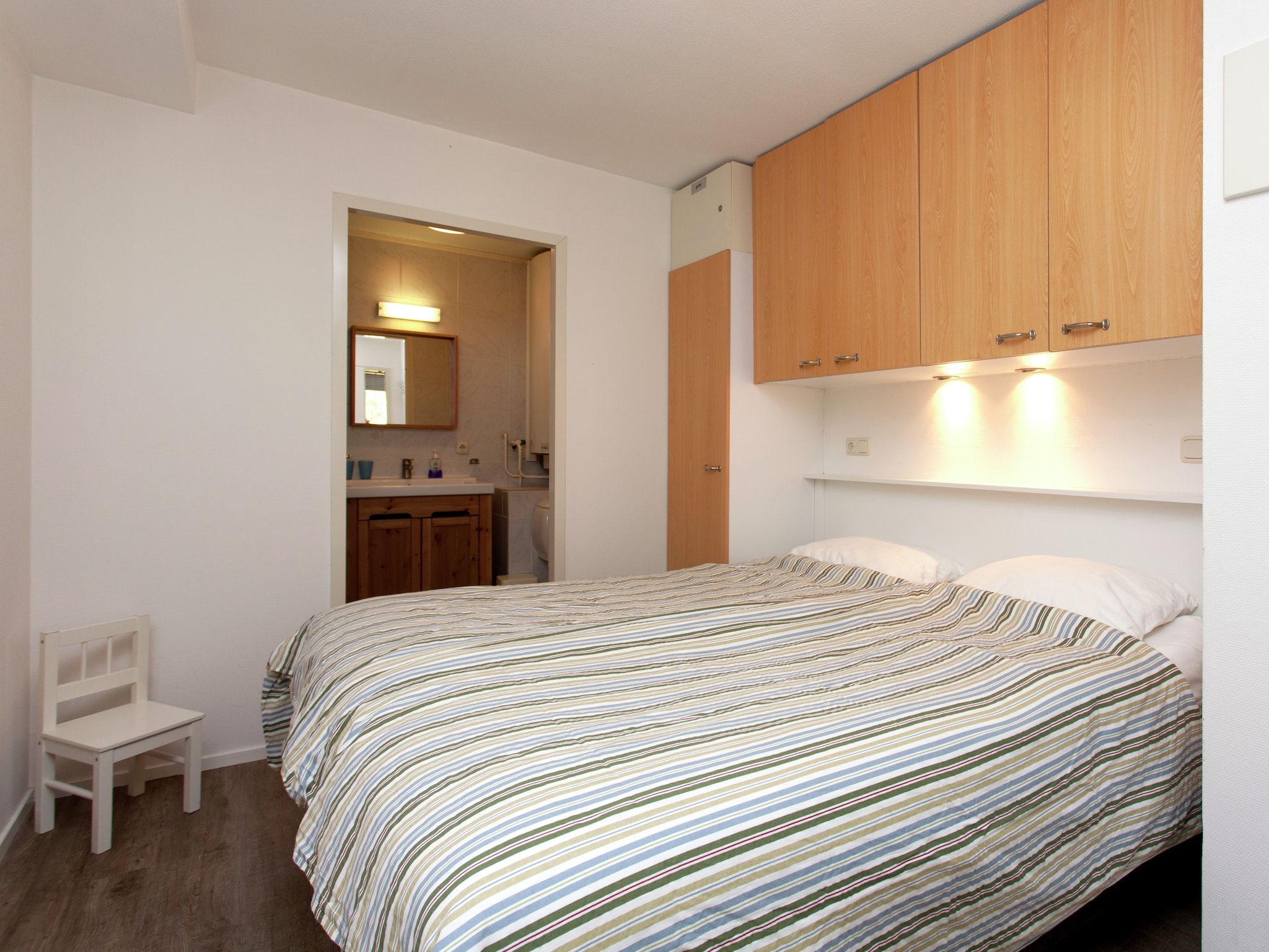 Een slaapkamer van Zandlust in Ameland