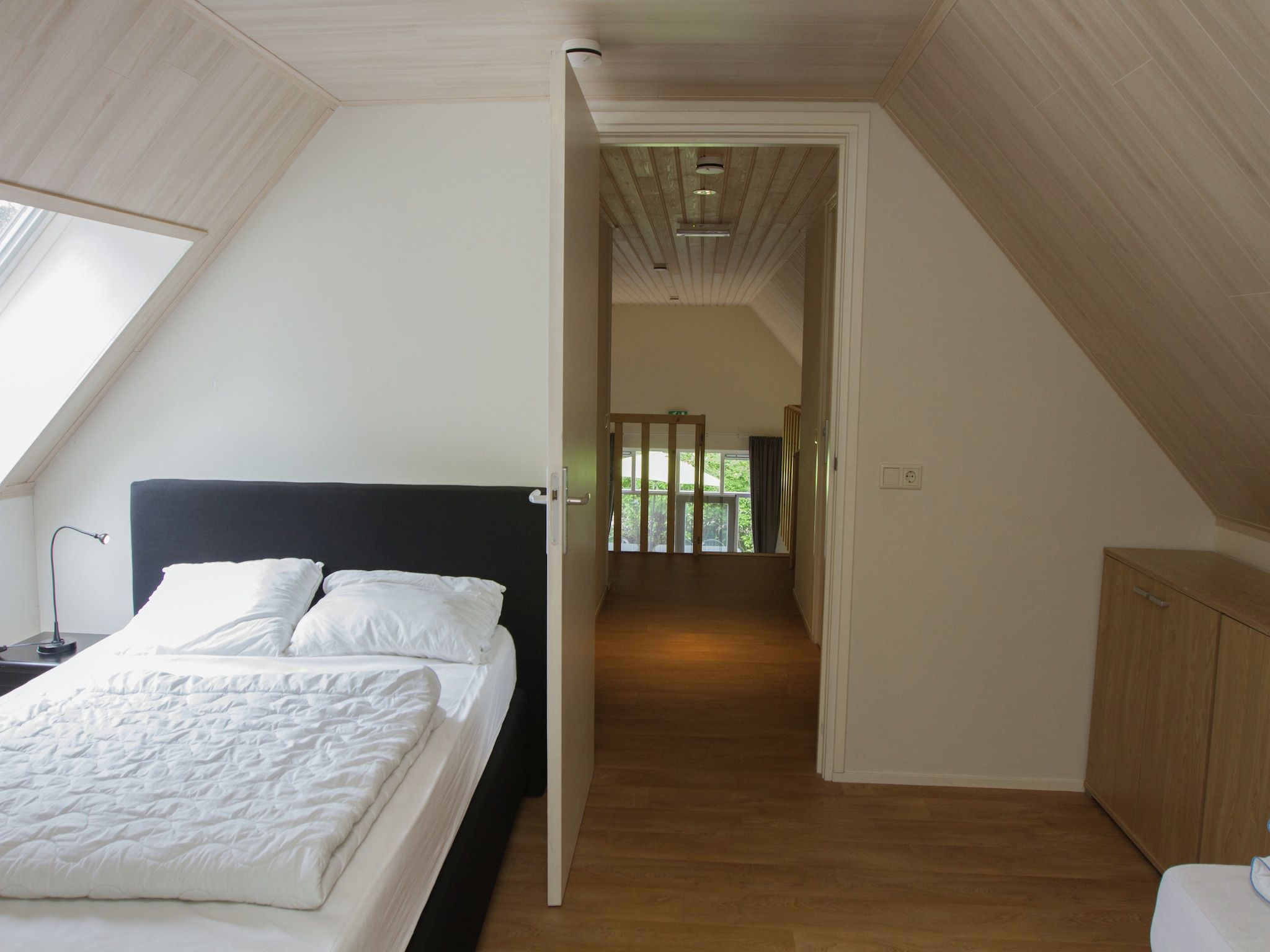 Een slaapkamer van de Lansert in Vessem