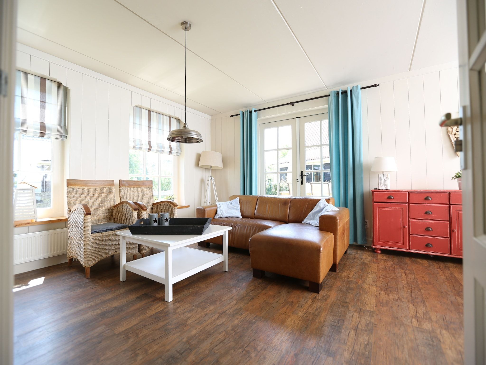 De woonkamer van Recreatiepark Wiringherlant  - Villa 4 in Hippolytushoef