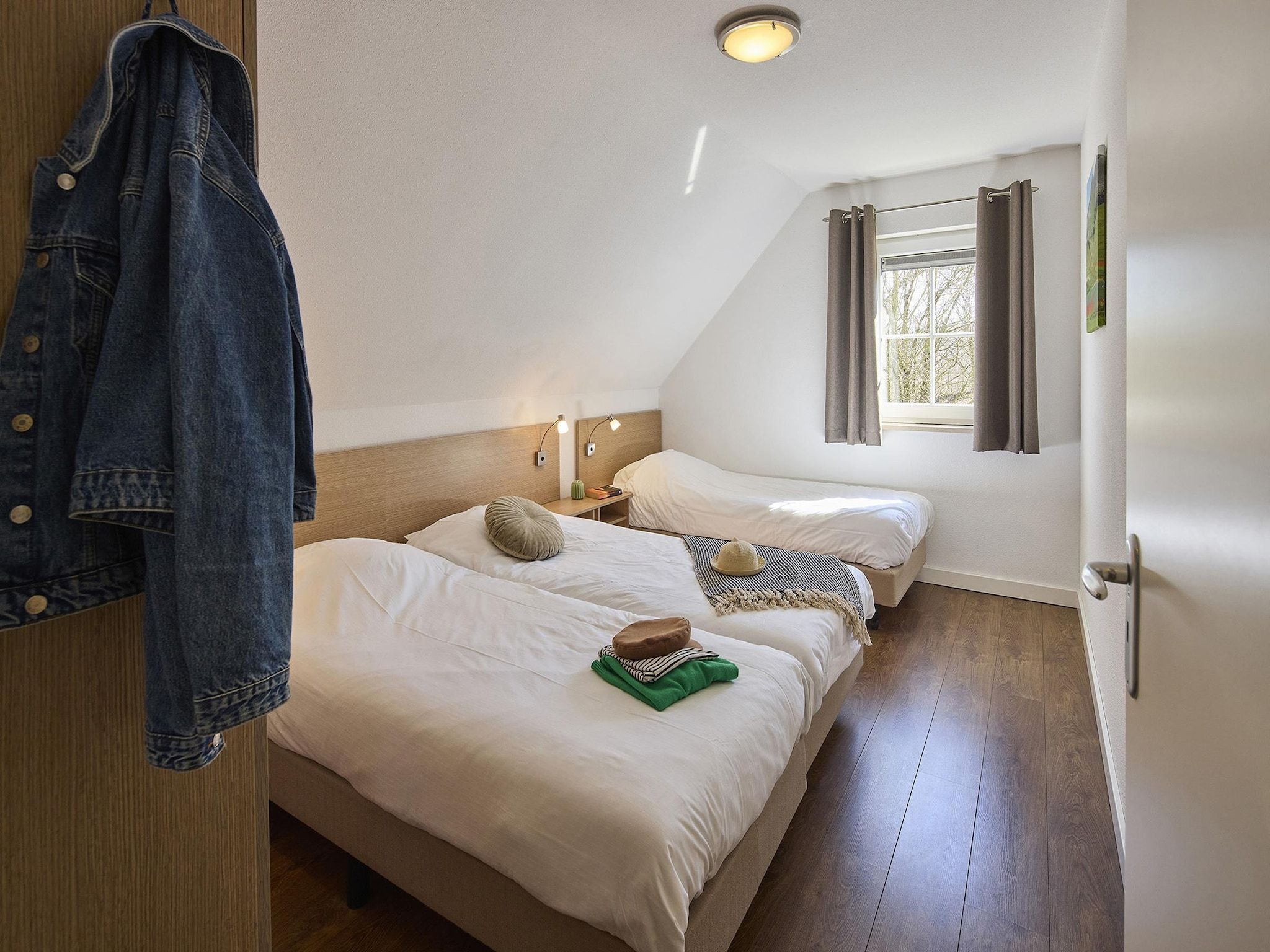 Een slaapkamer van Buitenhof De Leistert 13 in Roggel