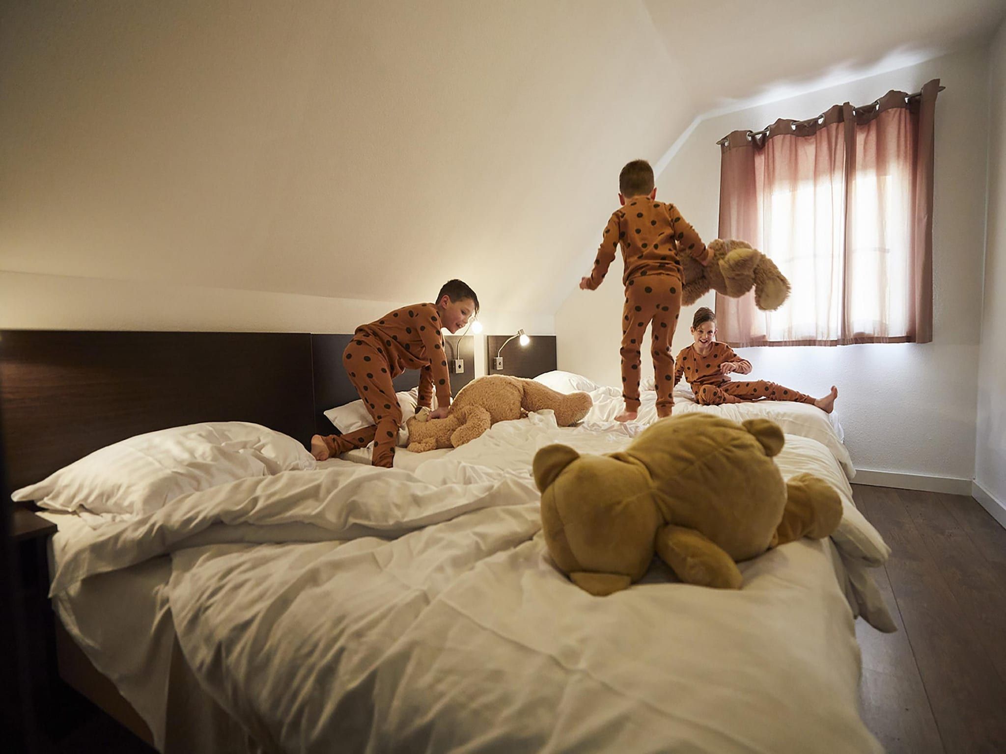 Een slaapkamer van Buitenhof De Leistert 7 in Roggel
