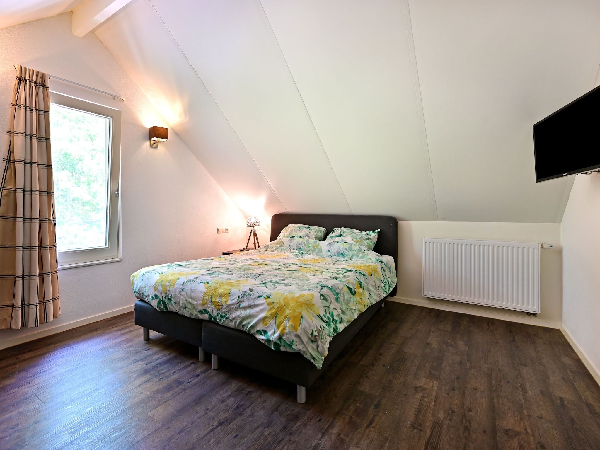 Een slaapkamer van Veldzicht in Reutum-Weerselo