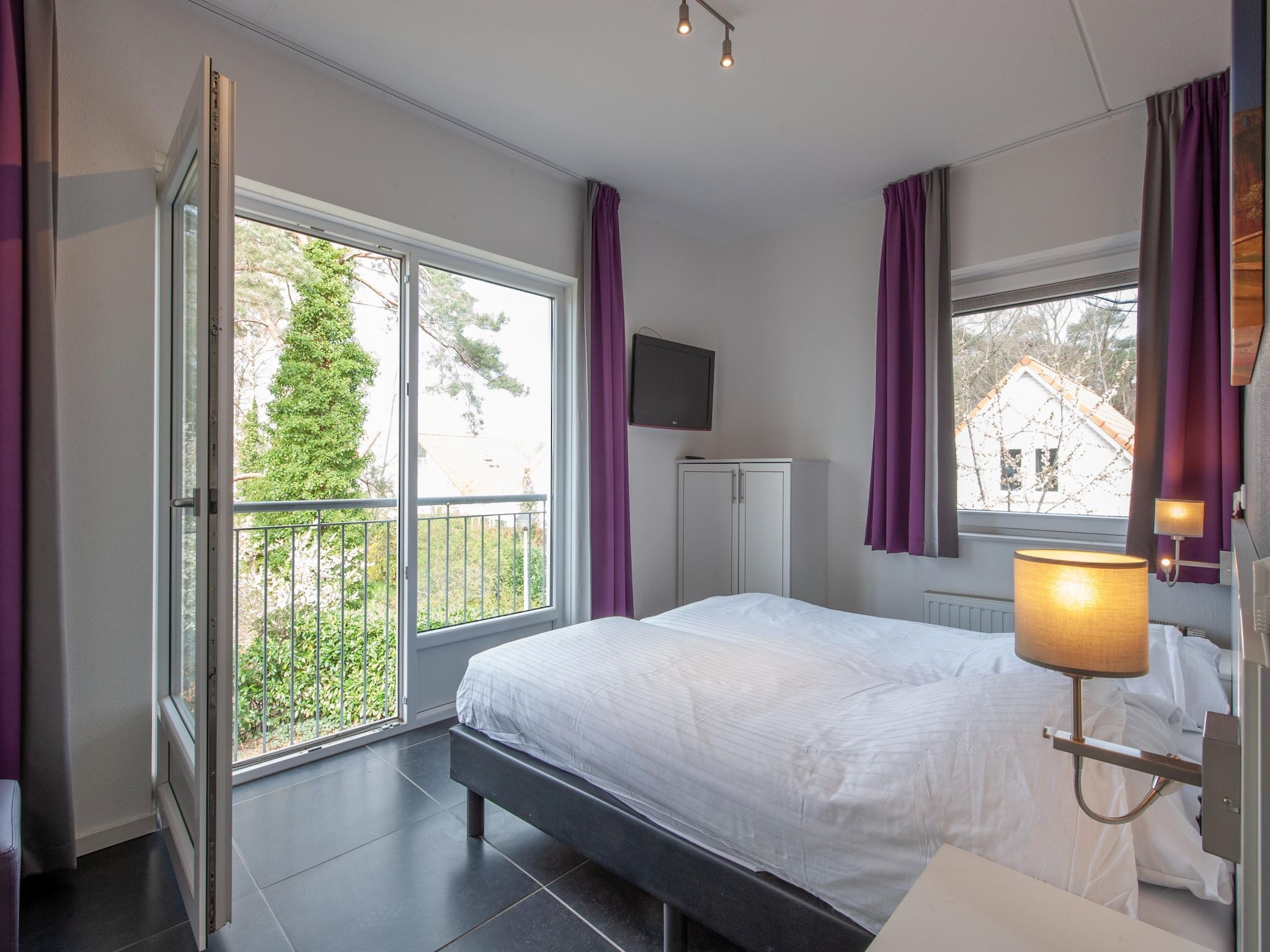 Een slaapkamer van Resort Arcen 3 in Arcen