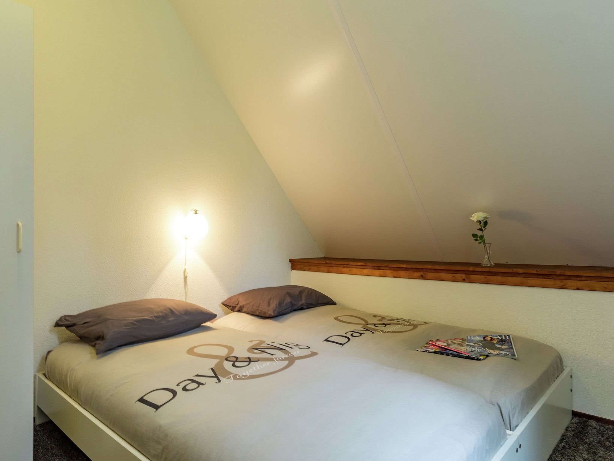 Een slaapkamer van De Notenweide in Zonnemaire