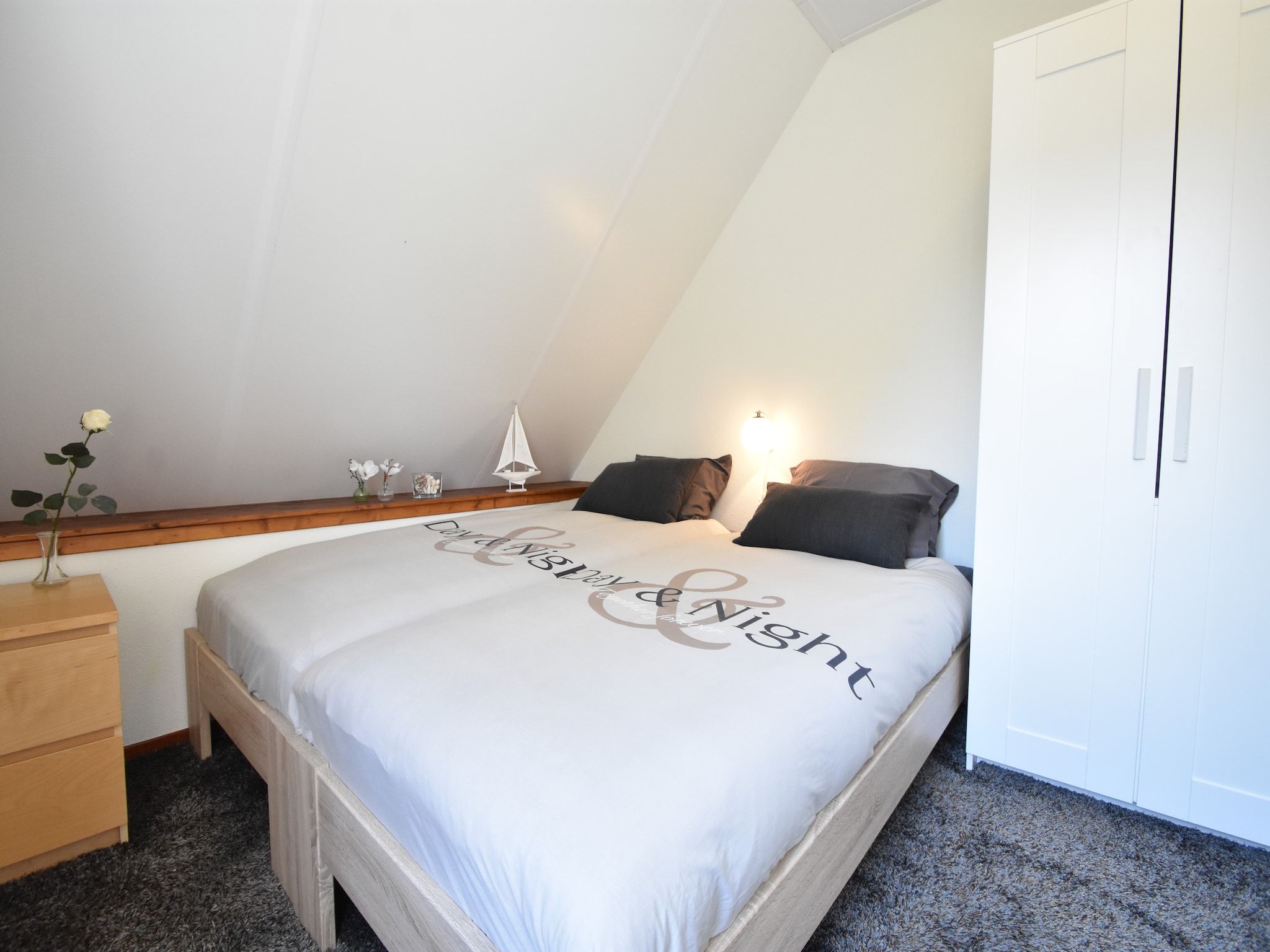 Een slaapkamer van De Notenweide in Zonnemaire