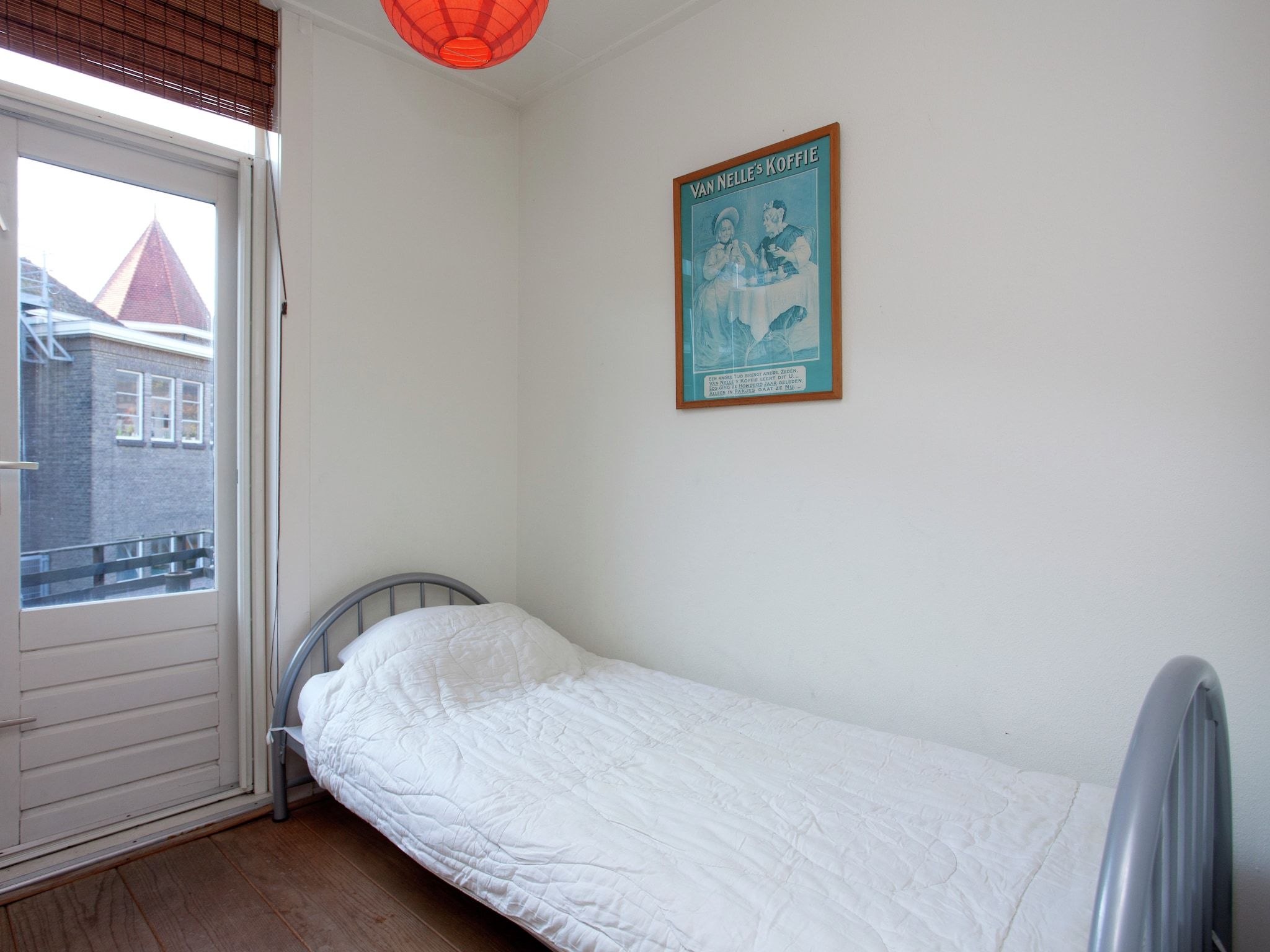 Een slaapkamer van Het Singeltje in Alkmaar