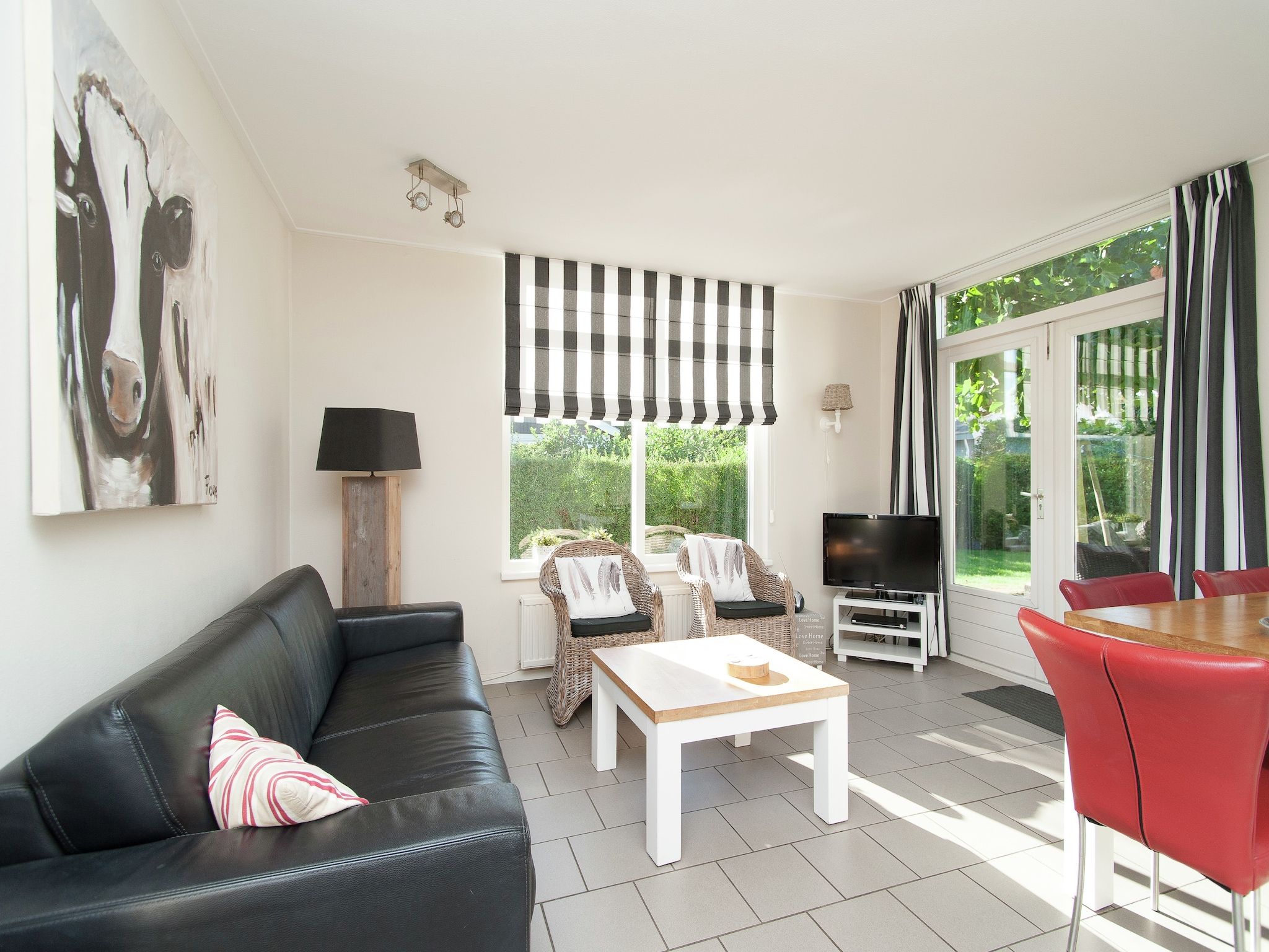 De woonkamer van Bungalowpark de Gouden Spar 2 in Noordwijk