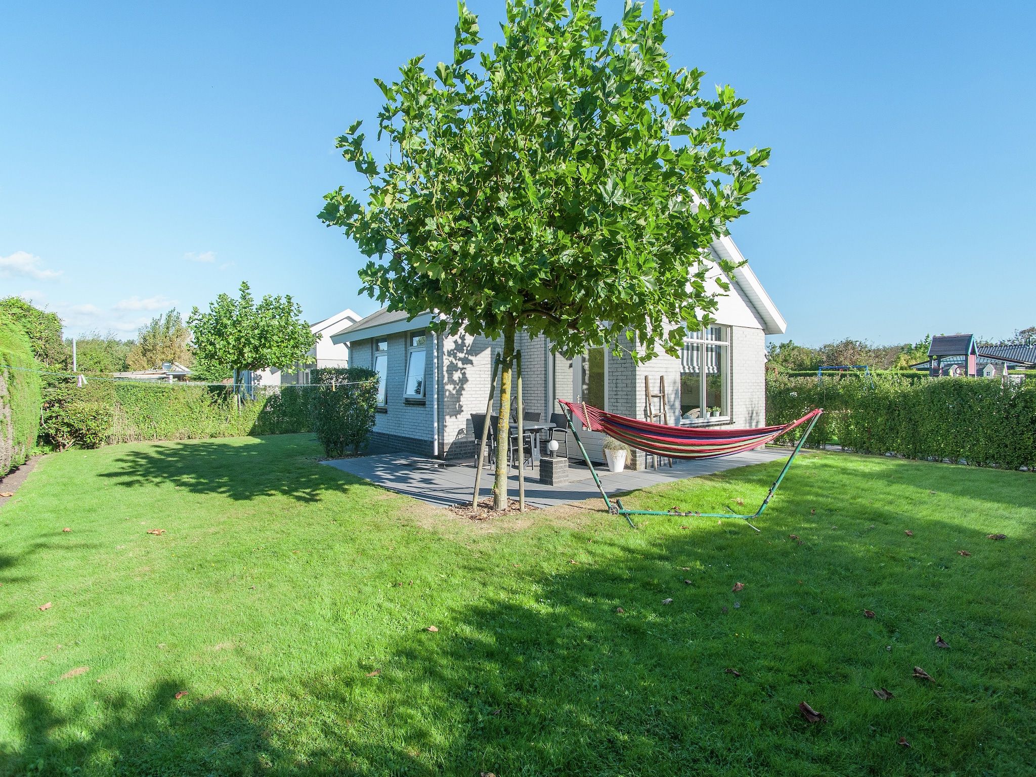 De tuin van Bungalowpark de Gouden Spar 2 in Noordwijk