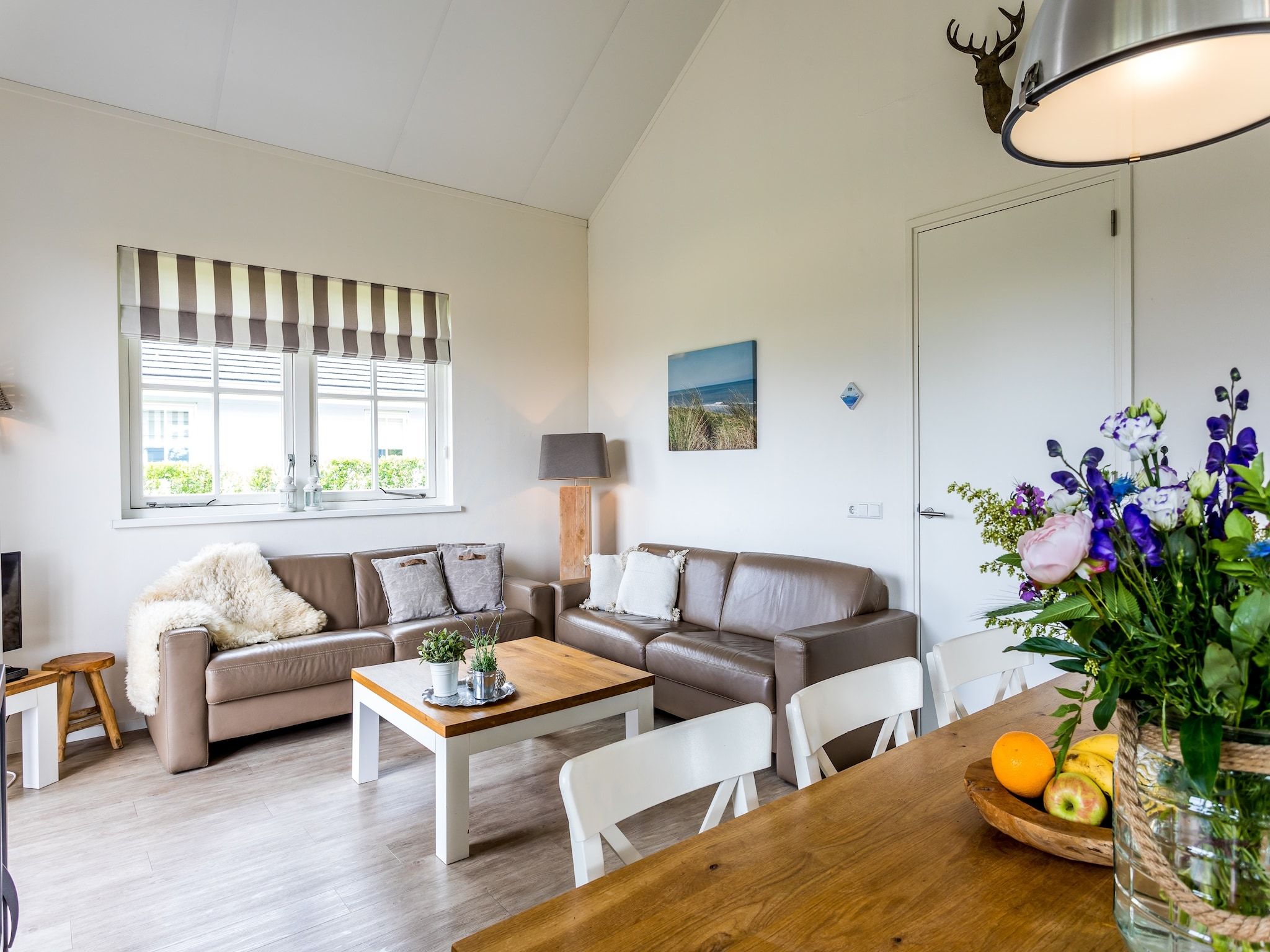 De woonkamer van Bungalowpark de Gouden Spar 3 in Noordwijk