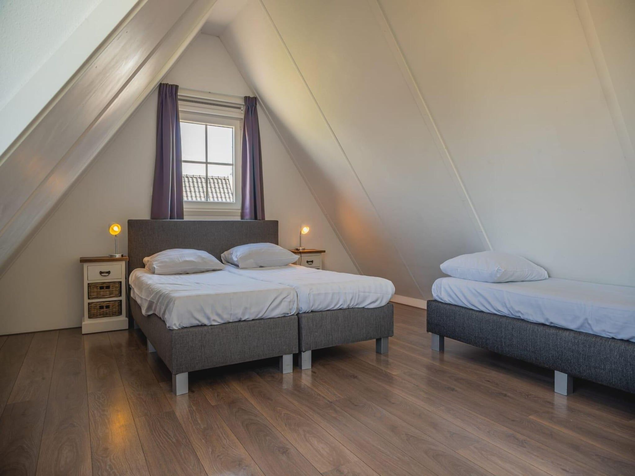 Een slaapkamer van 	Waterland  8 personen in West-Graftdijk