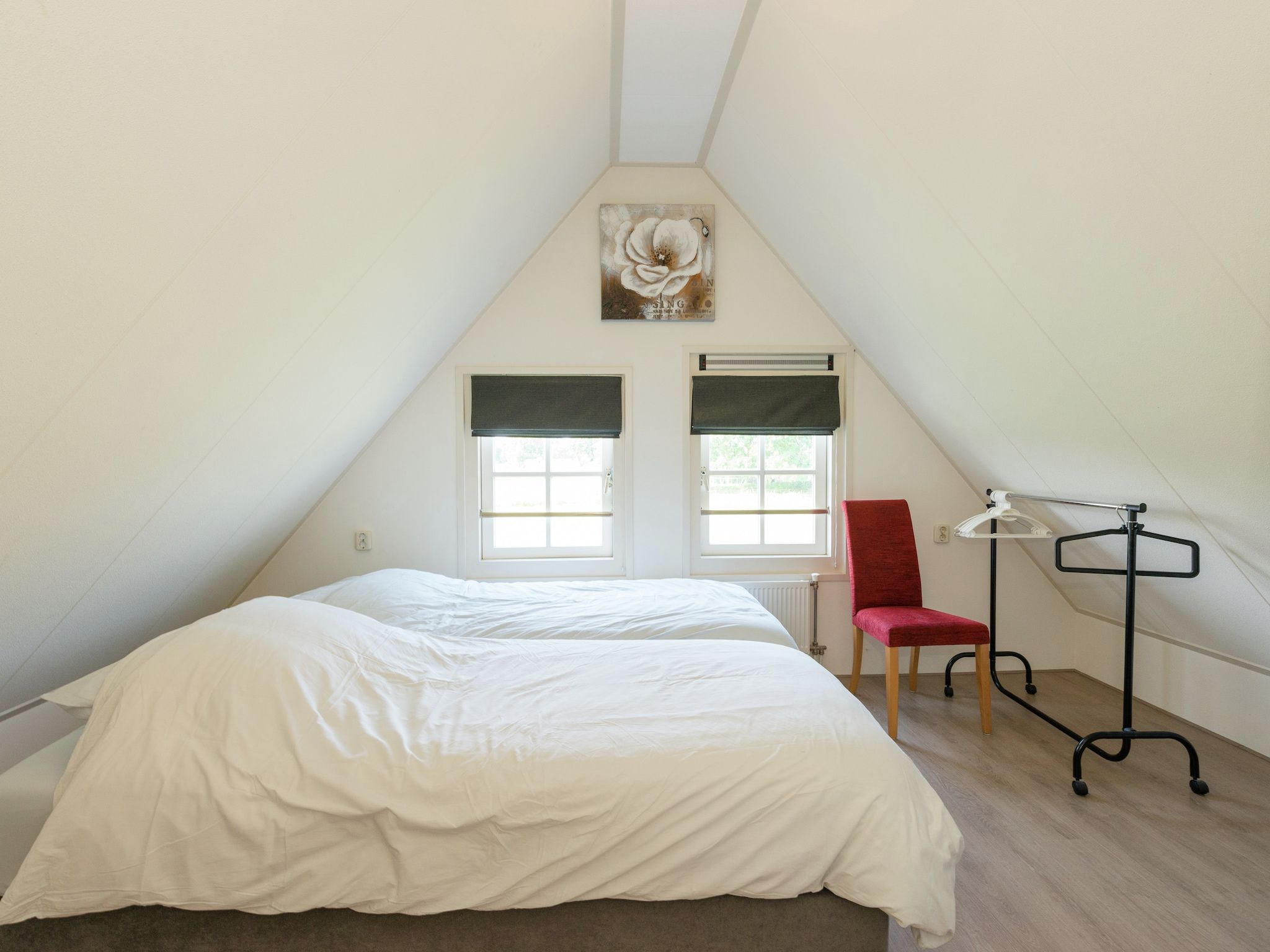 Een slaapkamer van De Grutto in Hippolytushoef