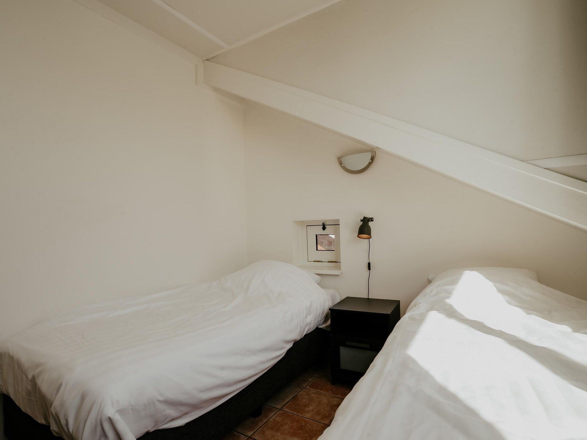 Een slaapkamer van Waterpark de Meerparel 4 in Uitgeest