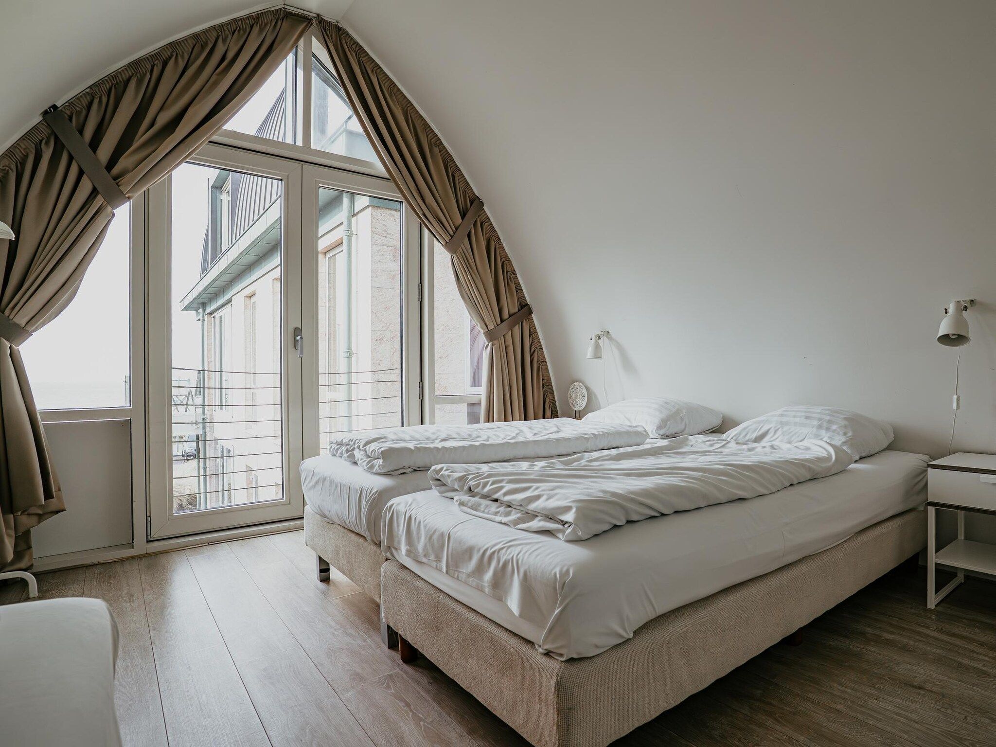Een slaapkamer van De ZeeParel Sea Fish in Egmond aan zee