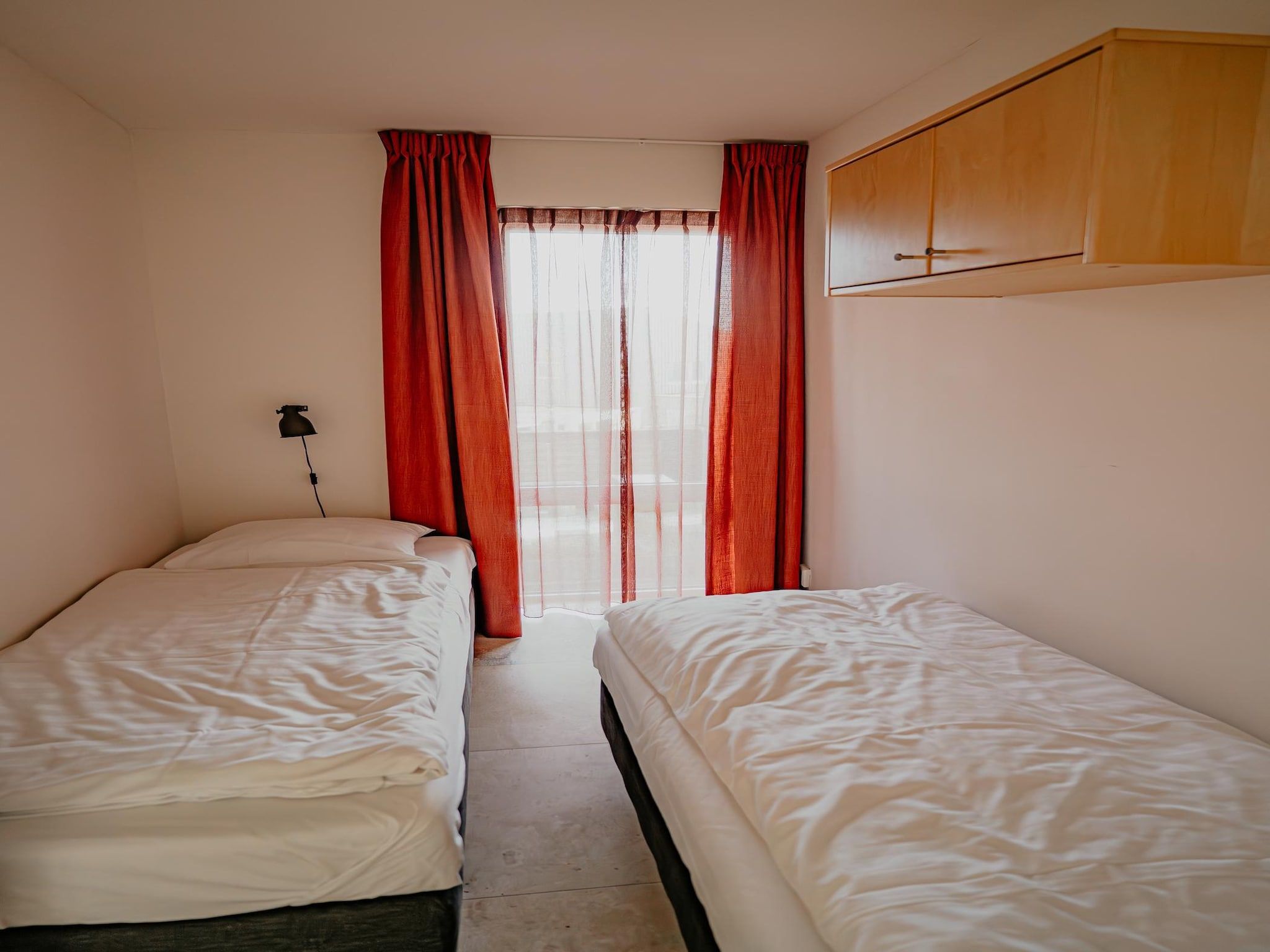 Een slaapkamer van De ZeeParel Sea Crab in Egmond aan zee