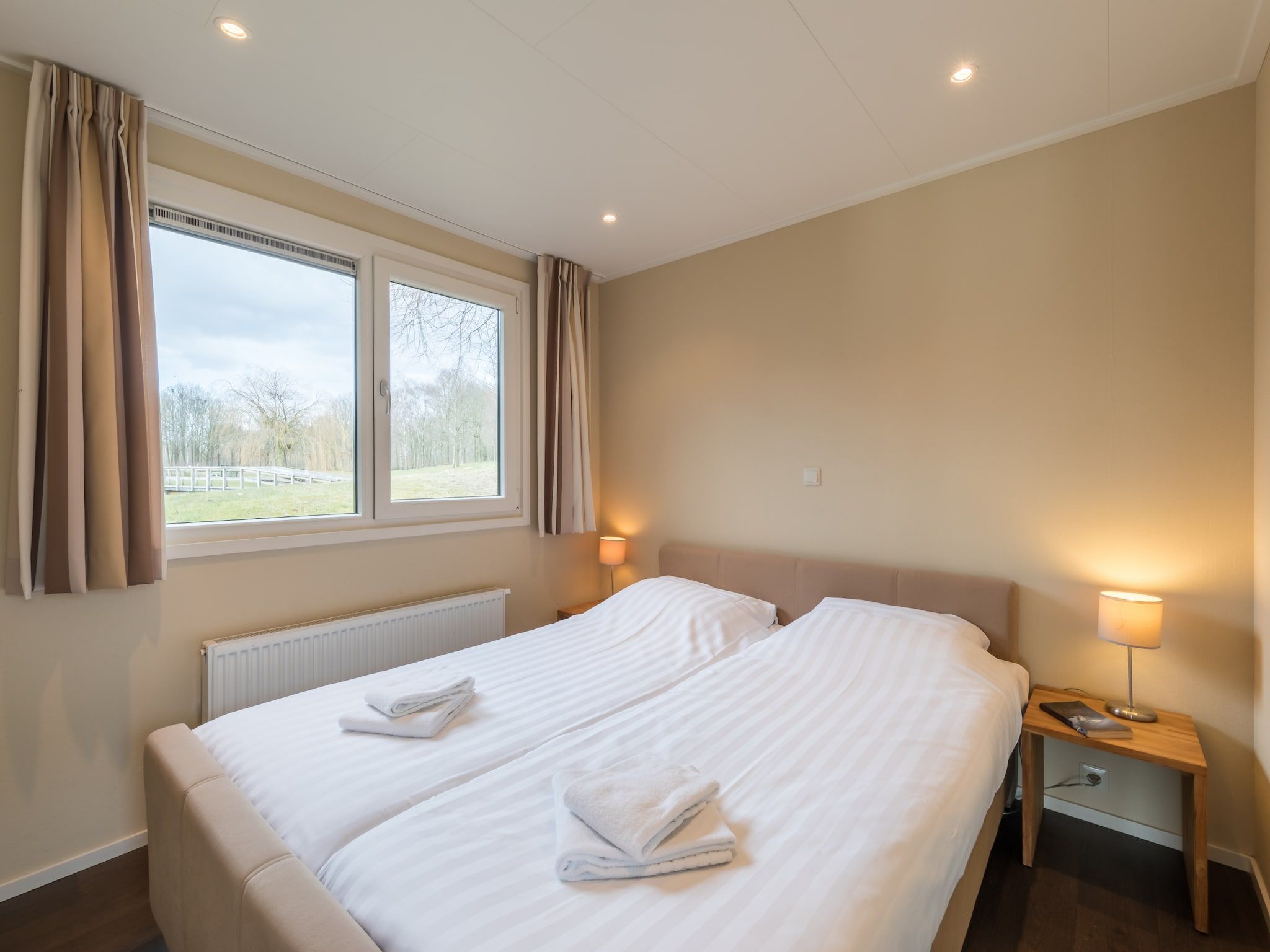 Een slaapkamer van Hunzepark 1 in Gasselternijveen