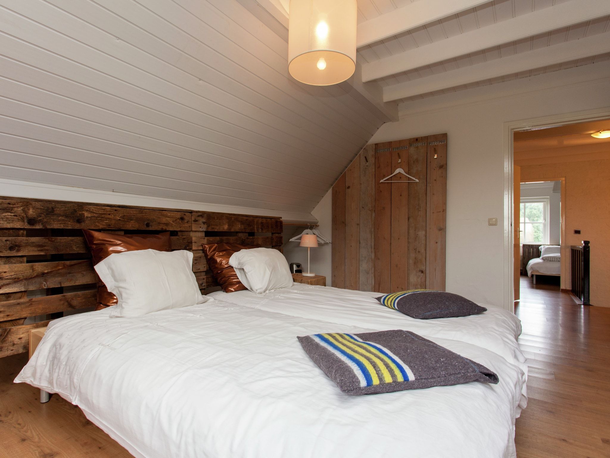 Een slaapkamer van Dorpswoning De Plek in Leende