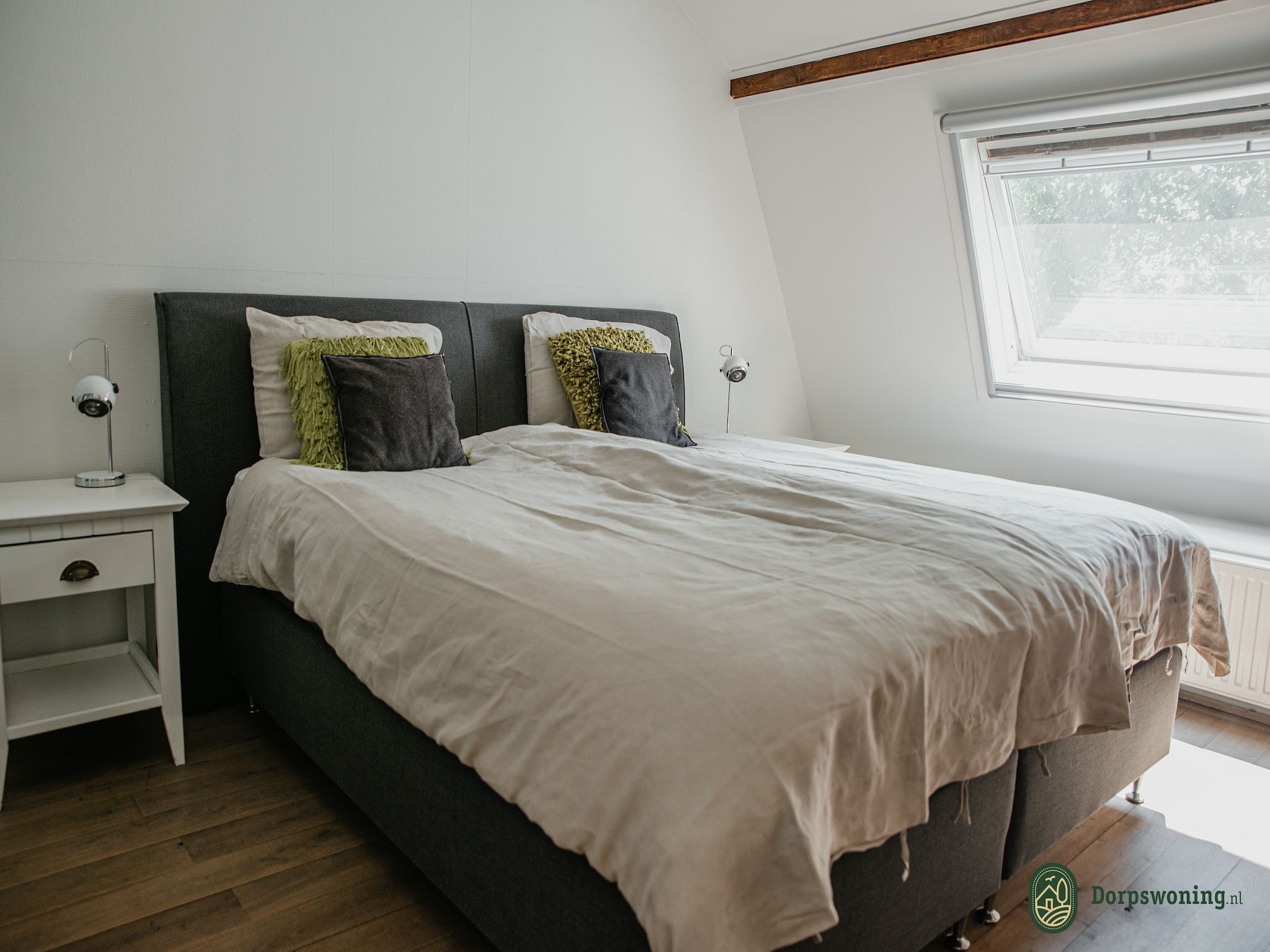 Een slaapkamer van Dorpswoning Op Niveau in Leende