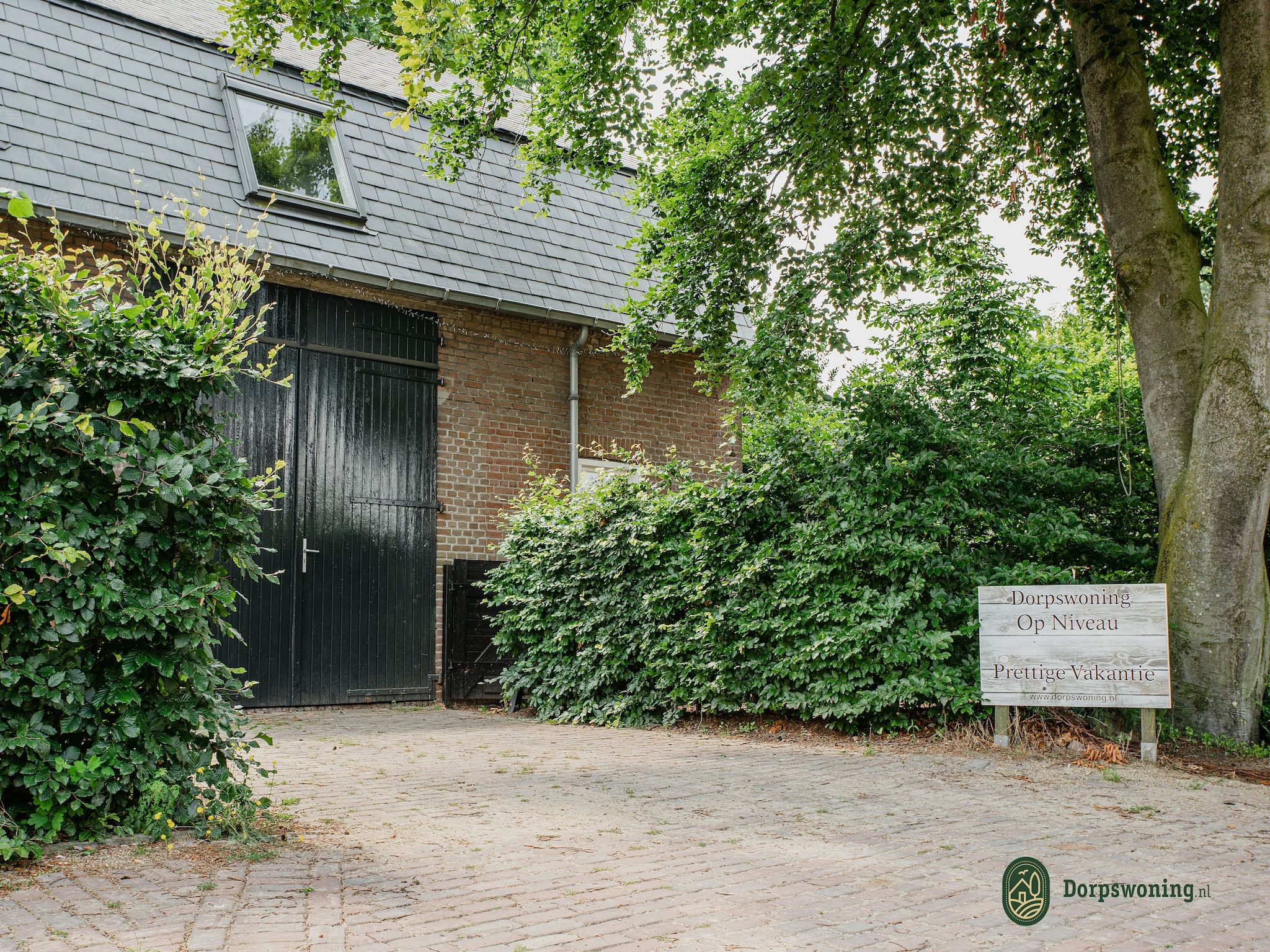 De buitenkant van Dorpswoning Op Niveau in Leende