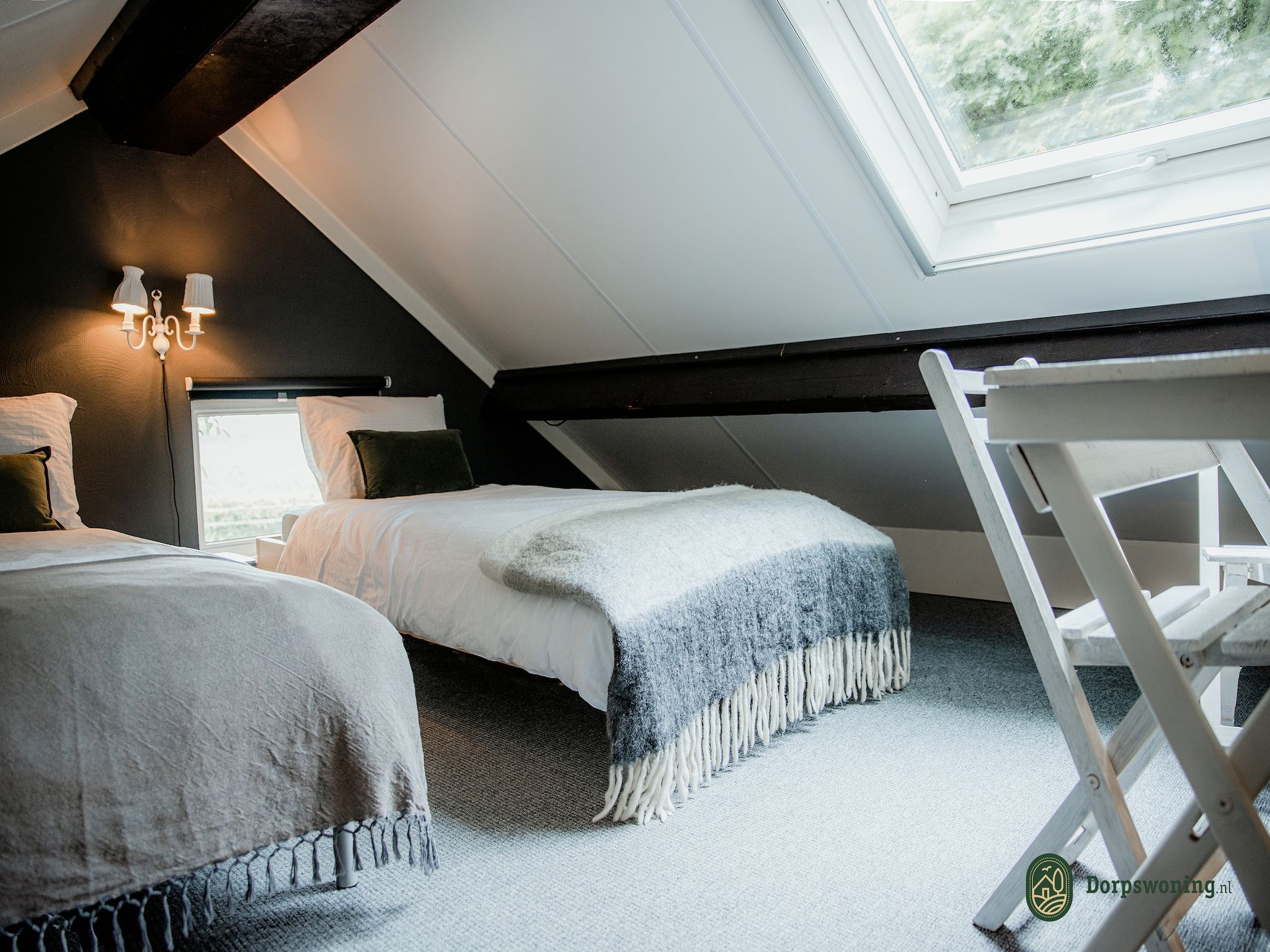 Een slaapkamer van Dorpswoning Het Knusse in Leende
