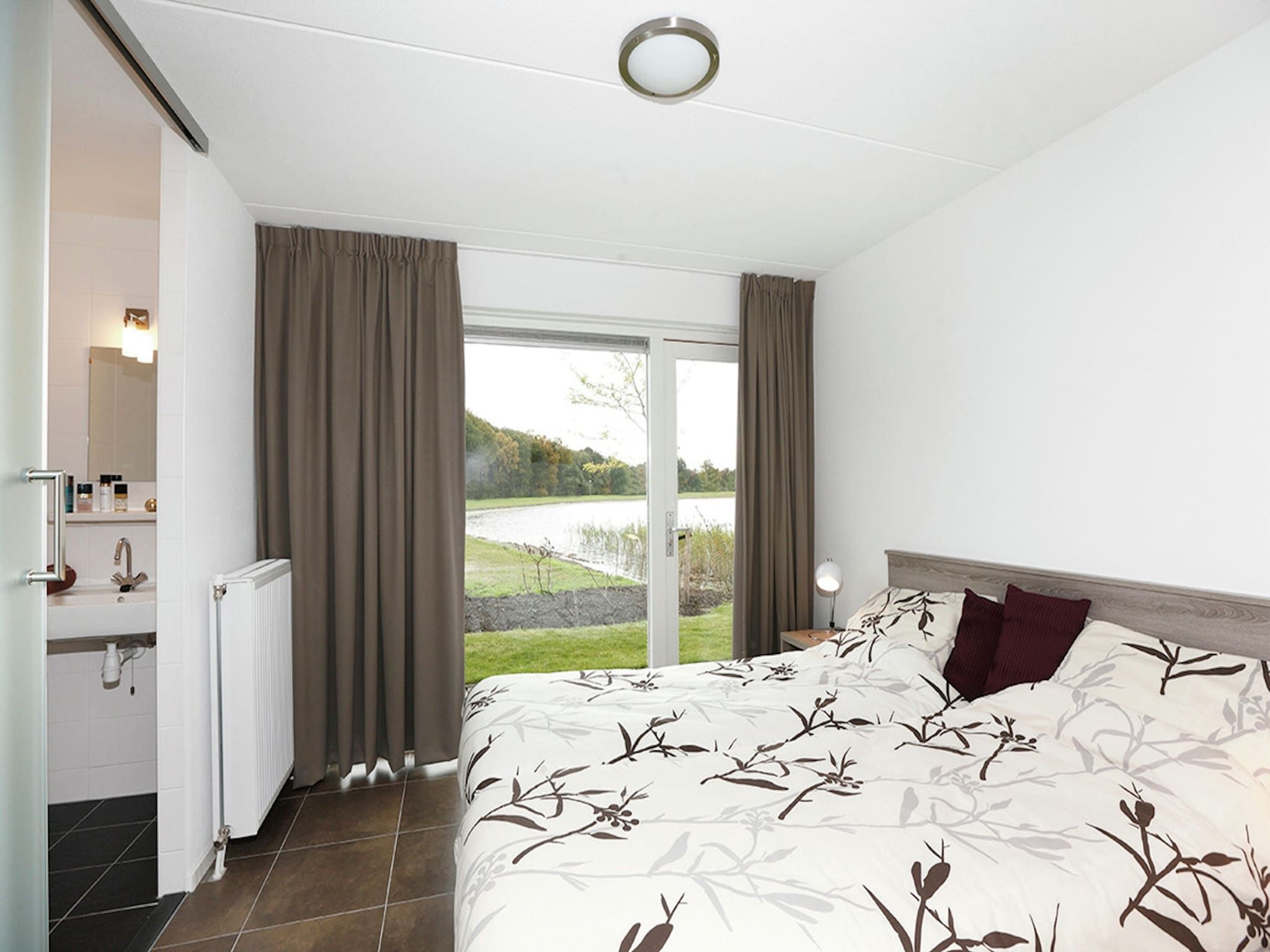 Een slaapkamer van Villapark Akenveen 1 in Tynaarlo