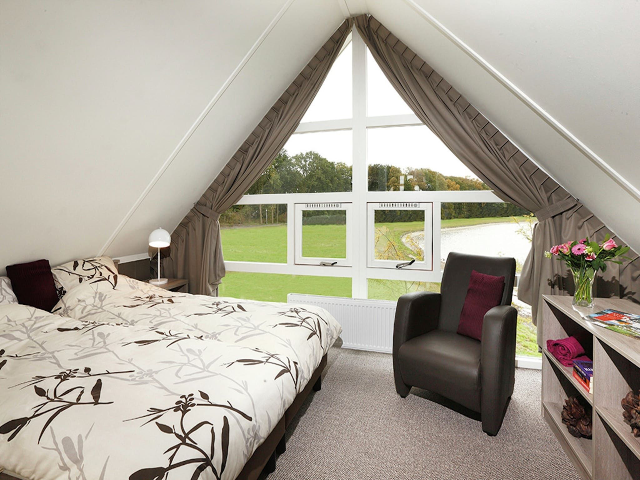 Een slaapkamer van Villapark Akenveen 1 in Tynaarlo