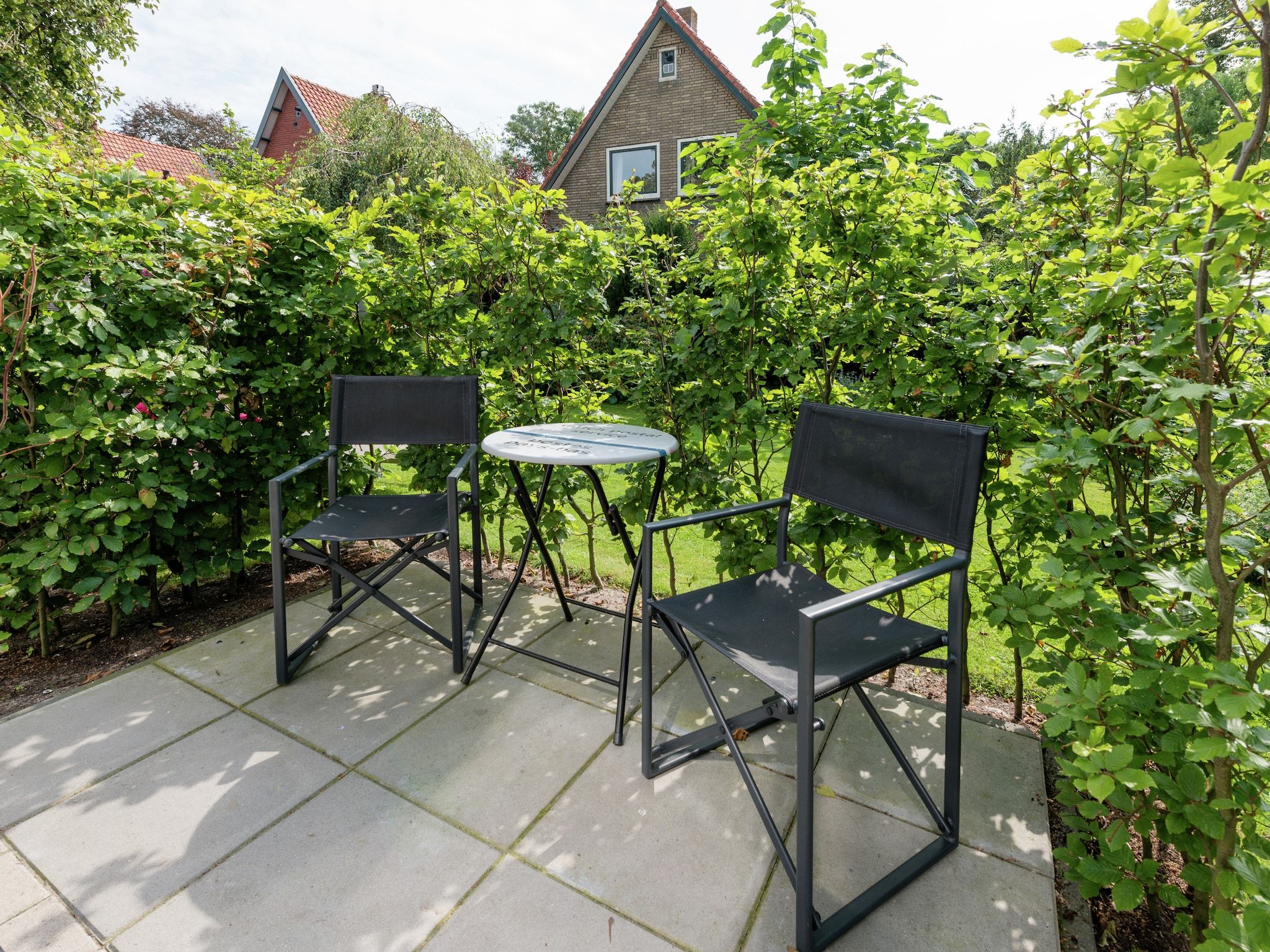 Het terras van Hof van Craeck III in Bergen
