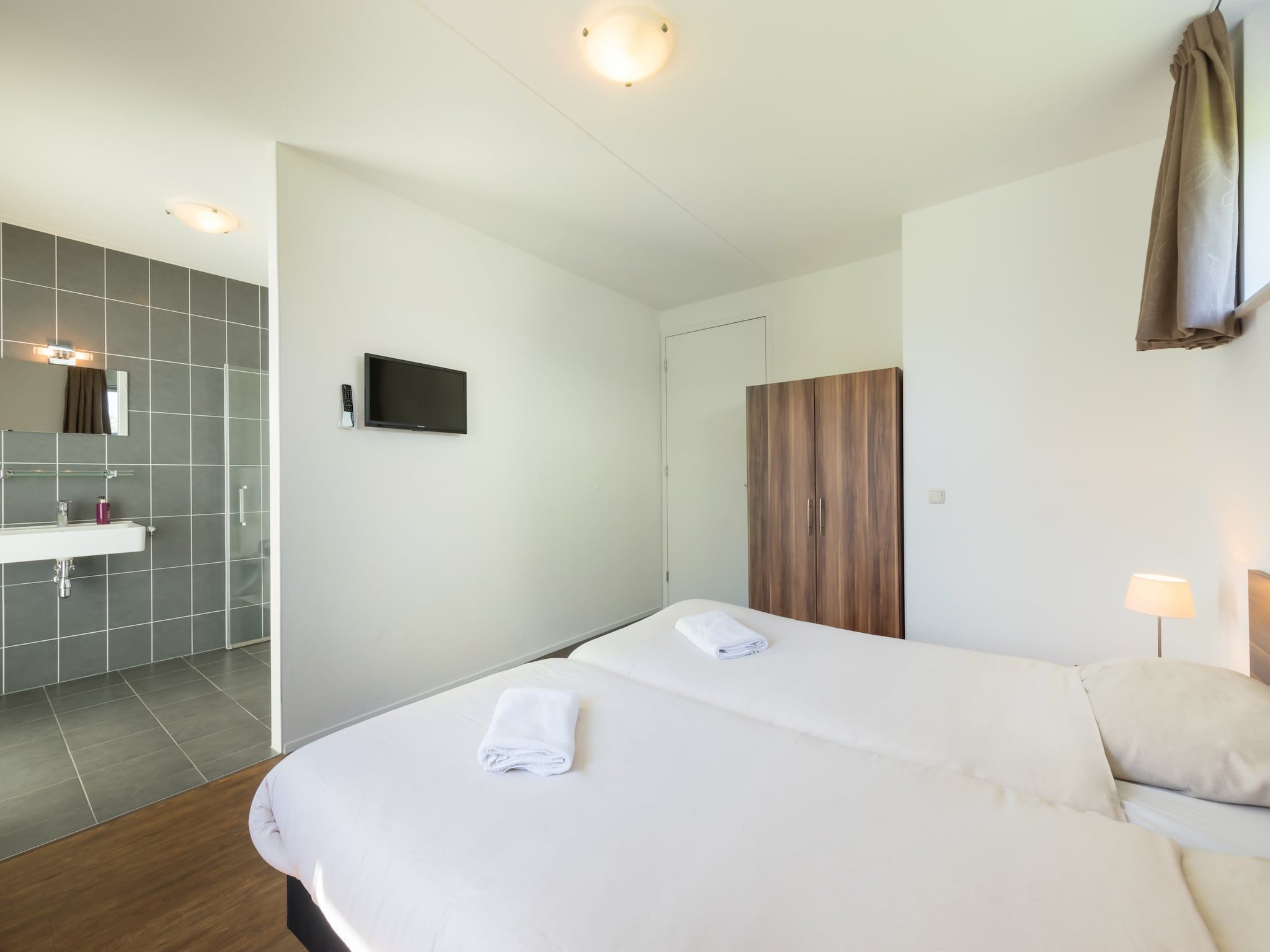 Een slaapkamer van Résidence de Weerribben 4 in Paasloo