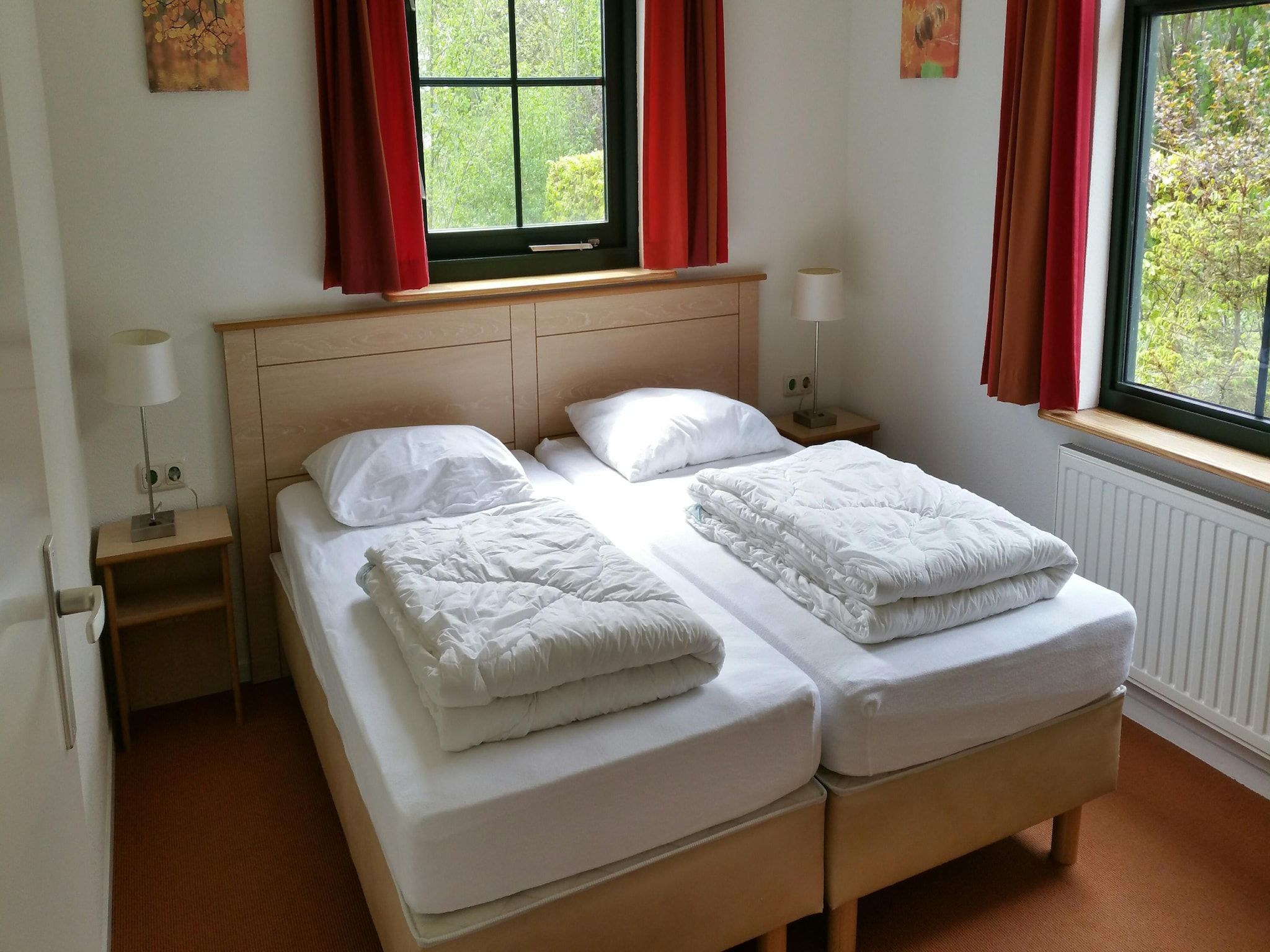 Een slaapkamer van Vakantiepark Eigen Wijze 3 in Bant