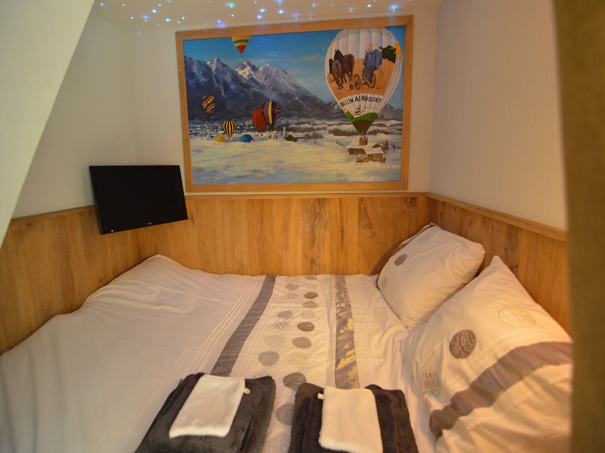 Een slaapkamer van Tramutana in Haaren