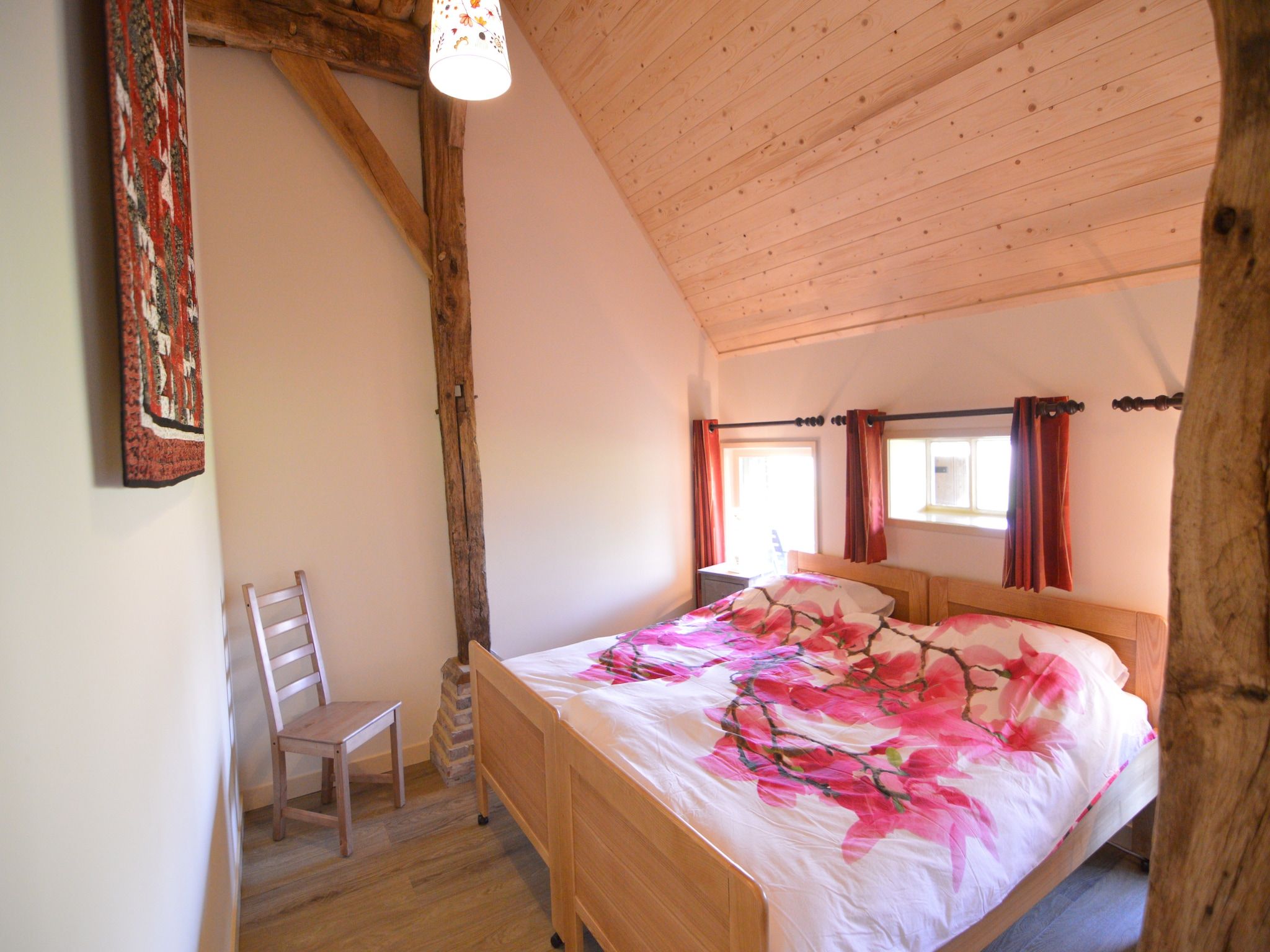 Een slaapkamer van Kabinet & Dekenkist in Geesteren