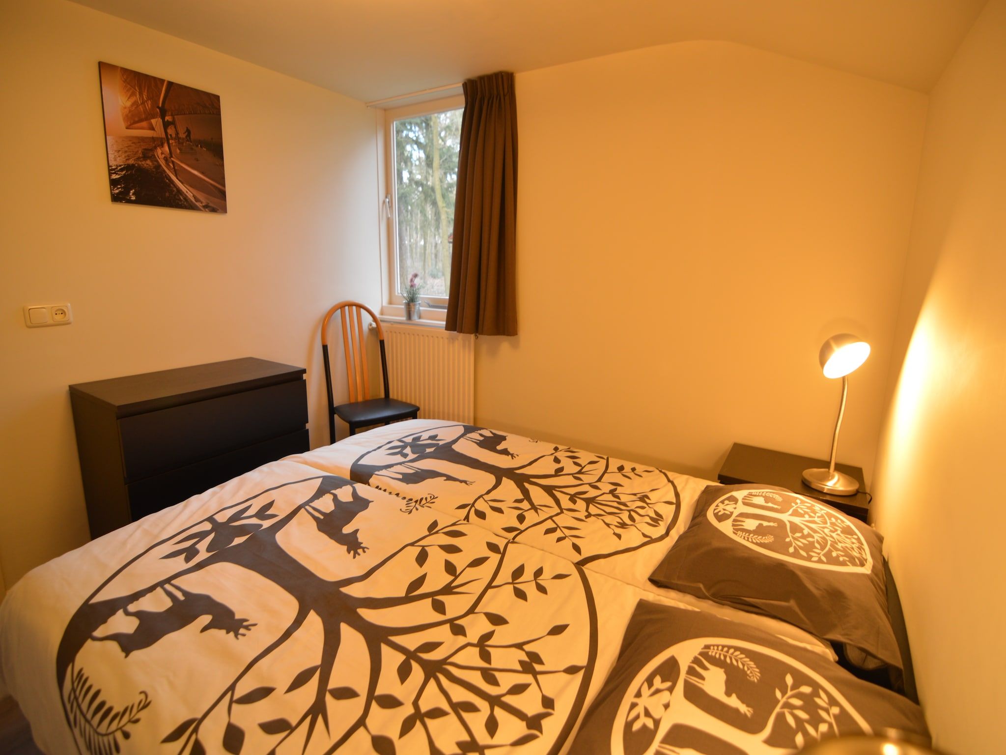 Een slaapkamer van Bungalow 27 in Stramproy