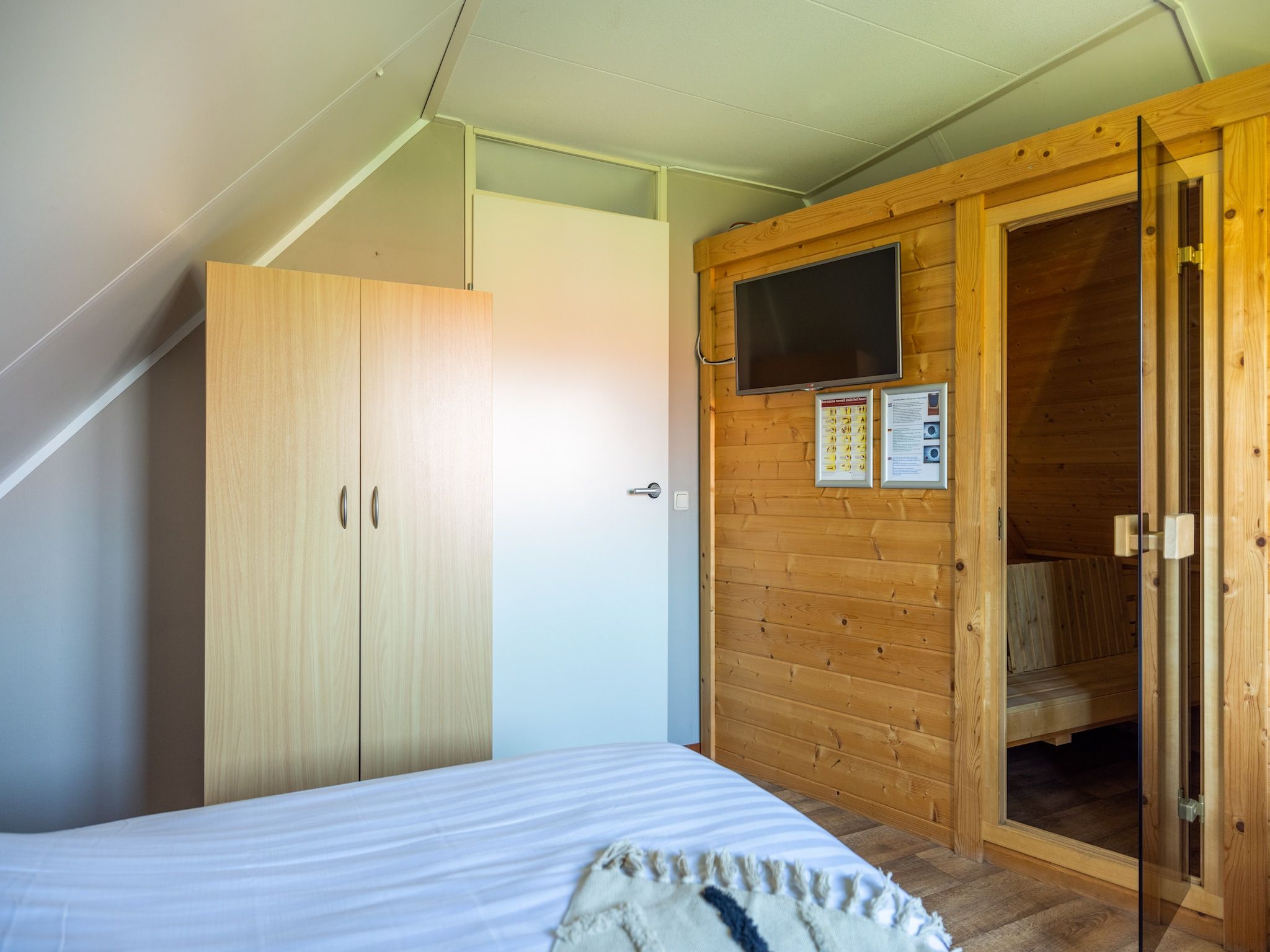 Een slaapkamer van Villavakantiepark IJsselhof 1 in Andijk